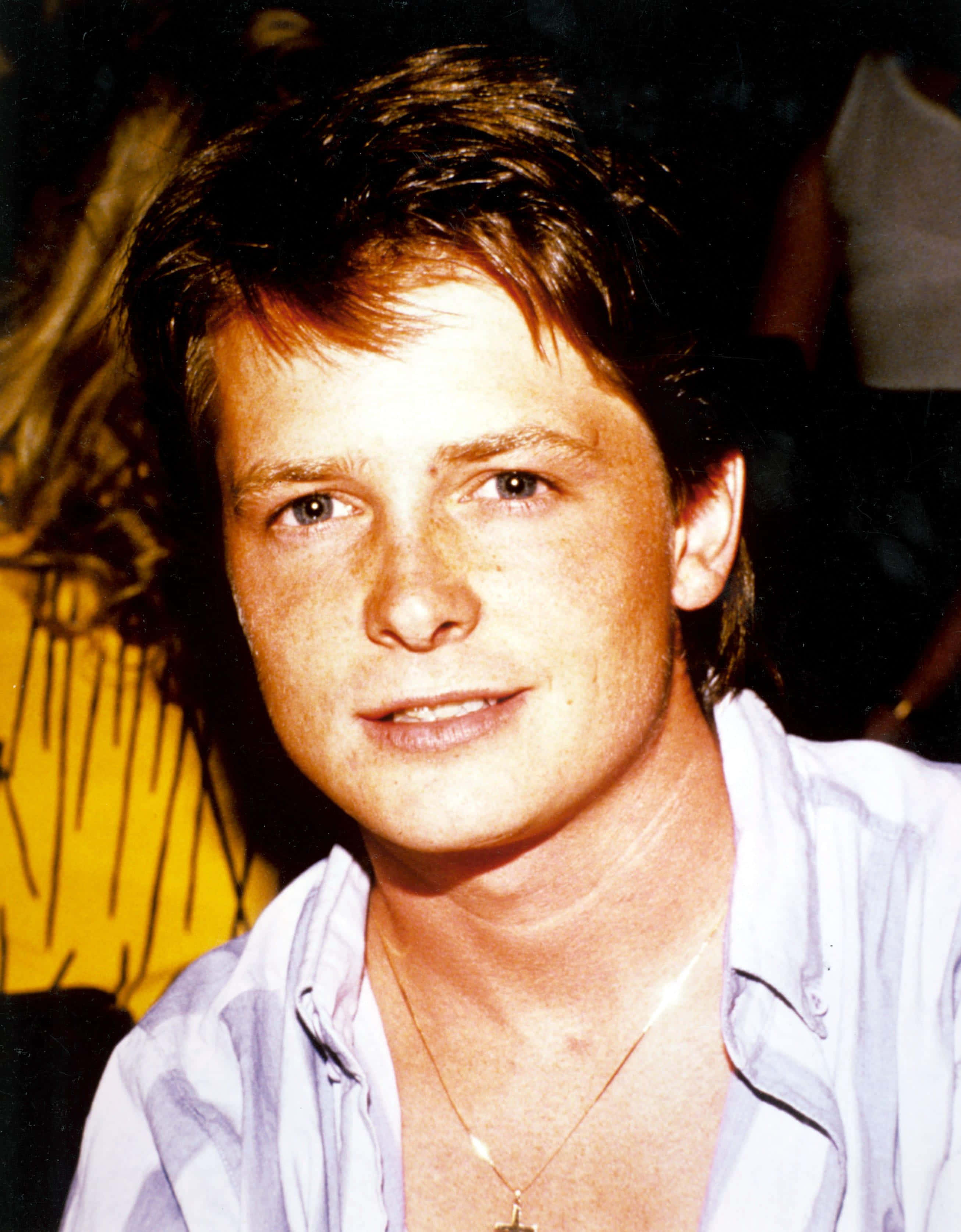 Michael J. Fox, tousled brown hair, freckles, 2K Phone Wallpaper