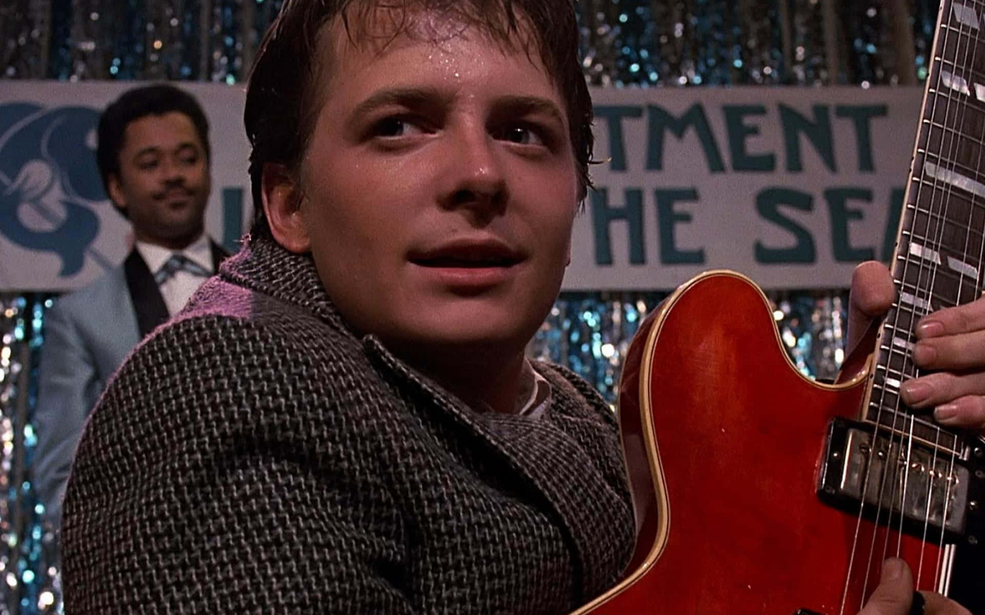 Michael J. Fox, houndstooth jacket, red electric guitar, Full HD Desktop Wallpaper