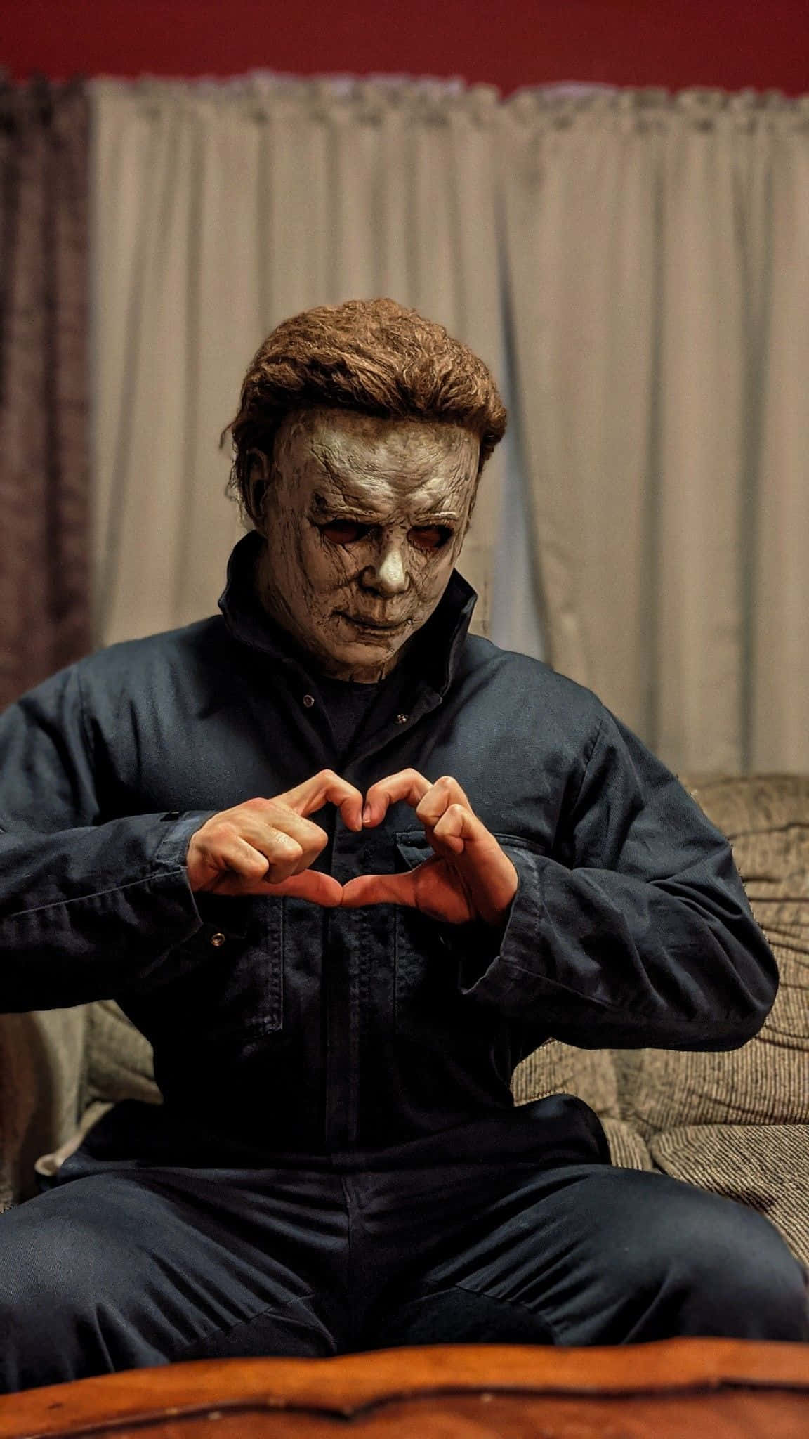 Michael Myers, iconic mask, couch, Full HD Phone Wallpaper