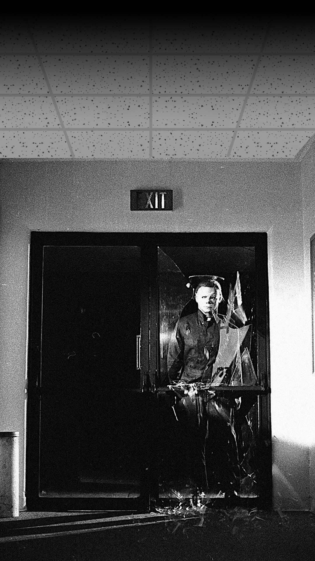 Michael Myers, shattered glass door, dimly lit hallway, Full HD Phone Wallpaper
