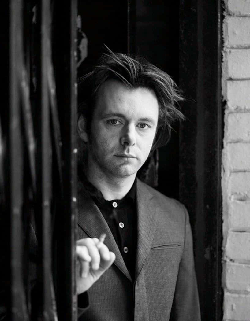 Michael Sheen, suit, dark bars, SD Phone Wallpaper
