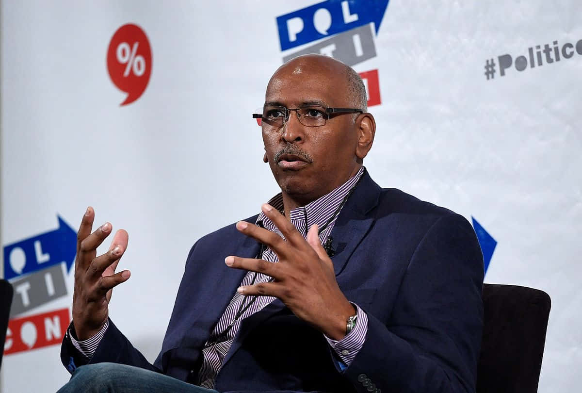 Michael Steele, conference stage, glasses, SD Desktop Wallpaper