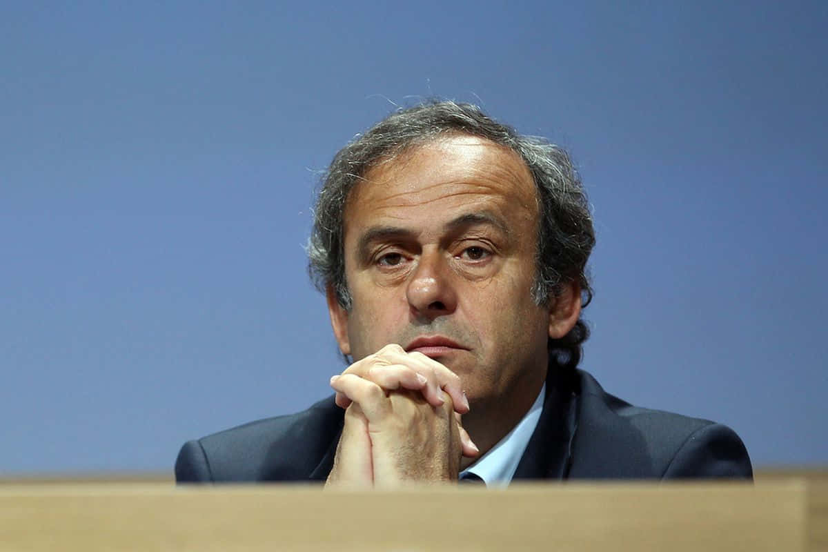 Michel Platini, suit, wooden table, SD Desktop Wallpaper