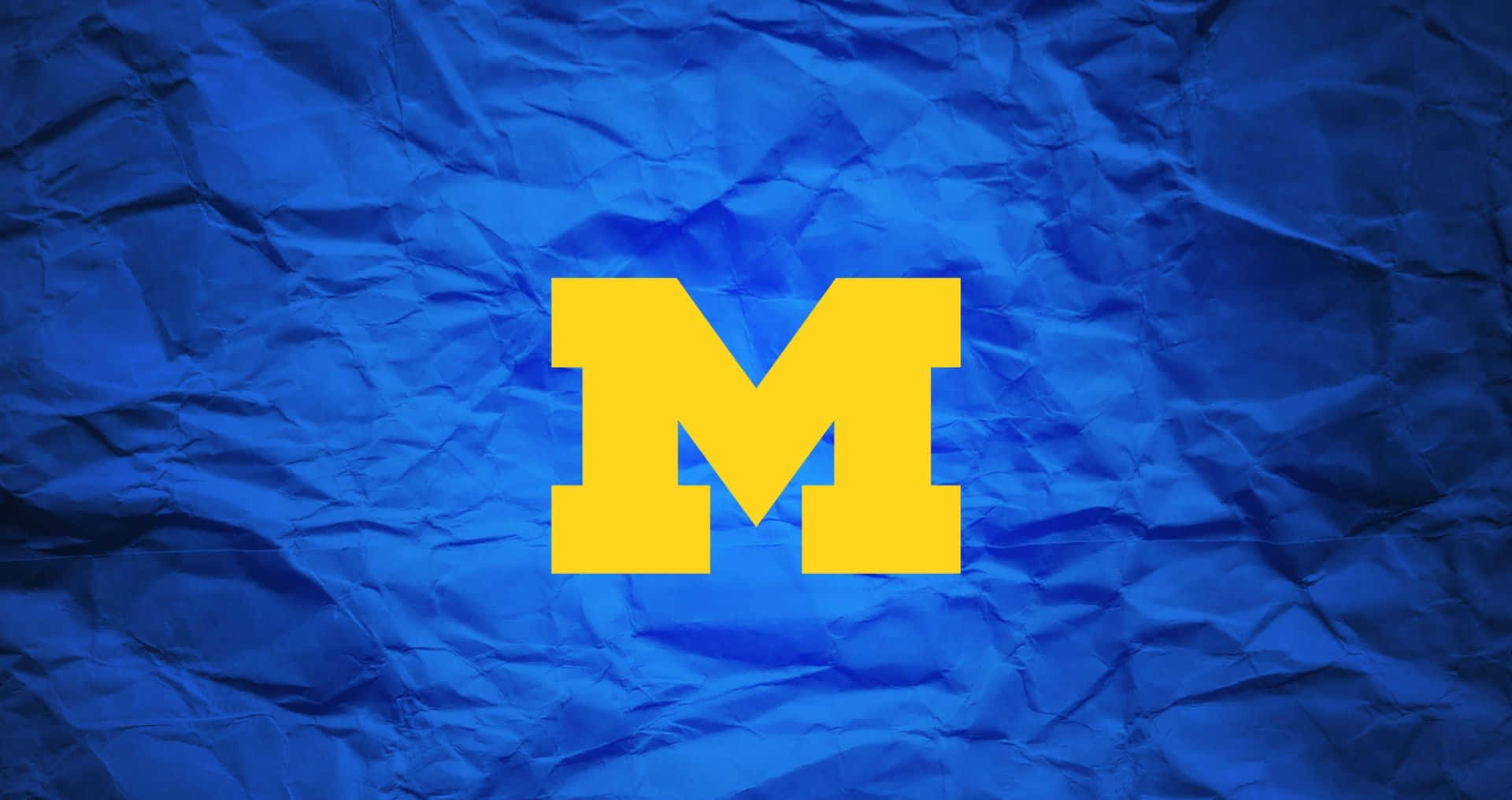 Michigan Wolverines, yellow block M logo, textured crumpled royal blue paper, Full HD Desktop Wallpaper