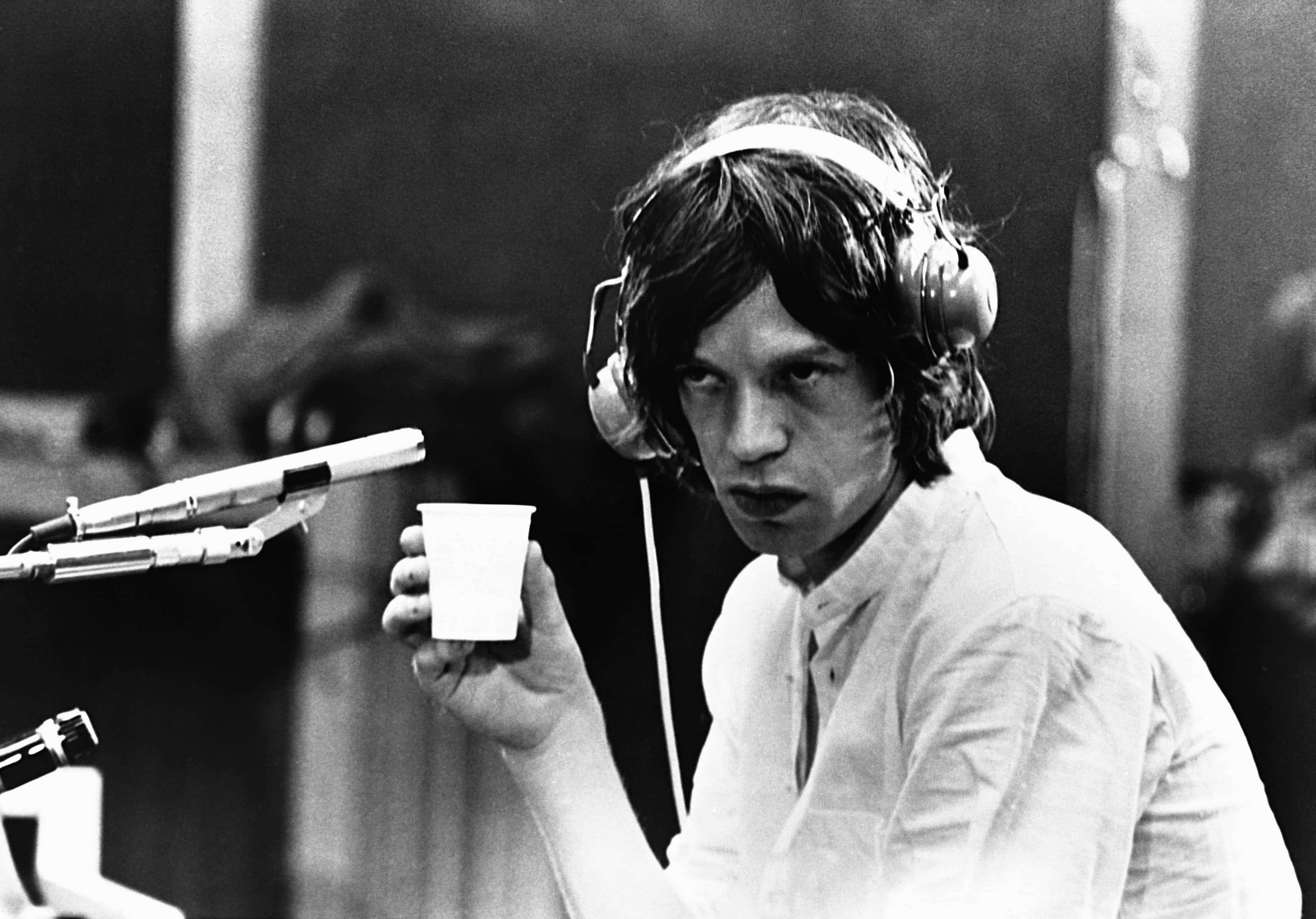 Mick Jagger, black and white photo, headphones, 2K Desktop Wallpaper