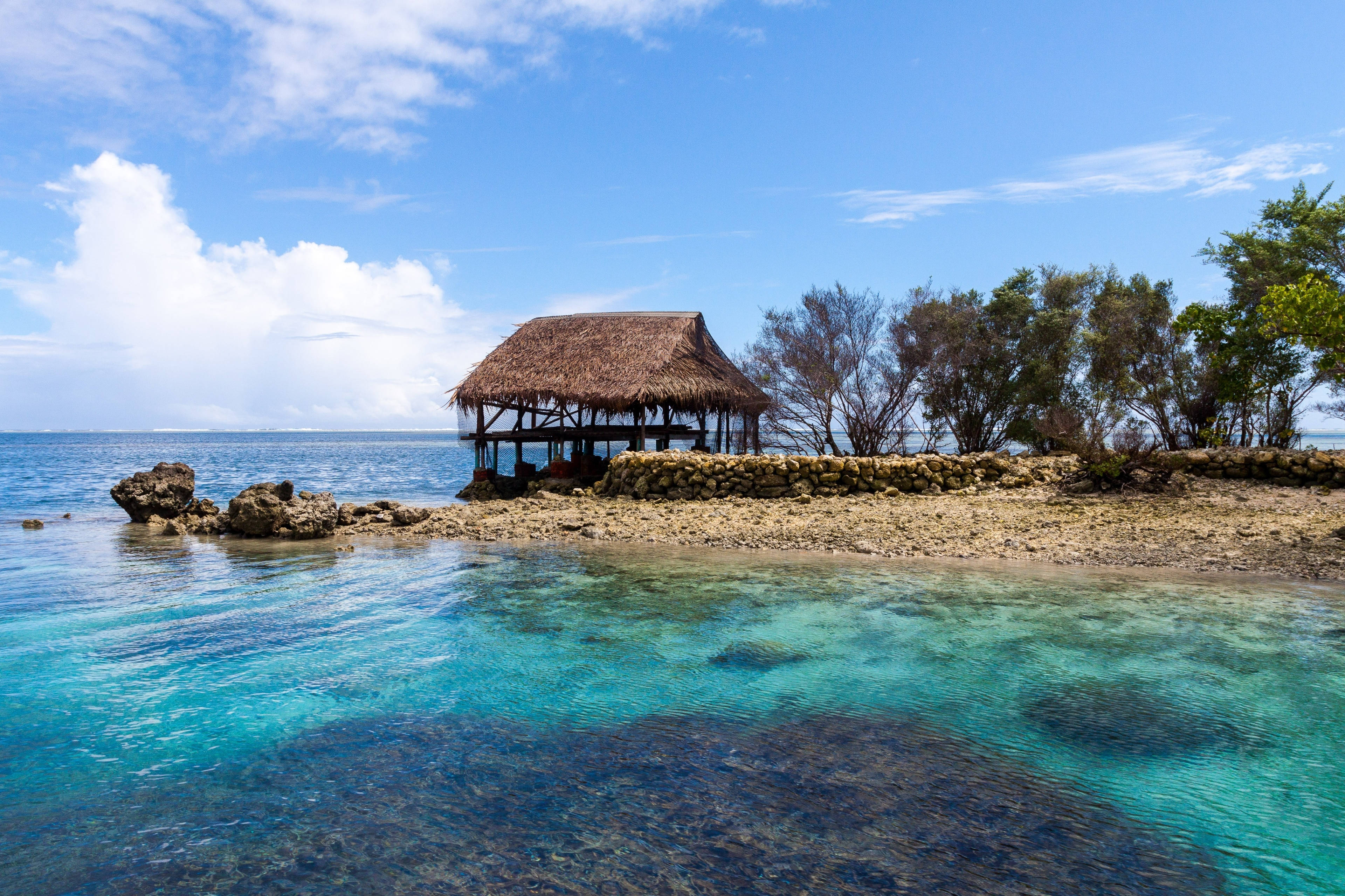 Micronesia, thatched-roof hut, rocky shore, 4K Desktop Wallpaper
