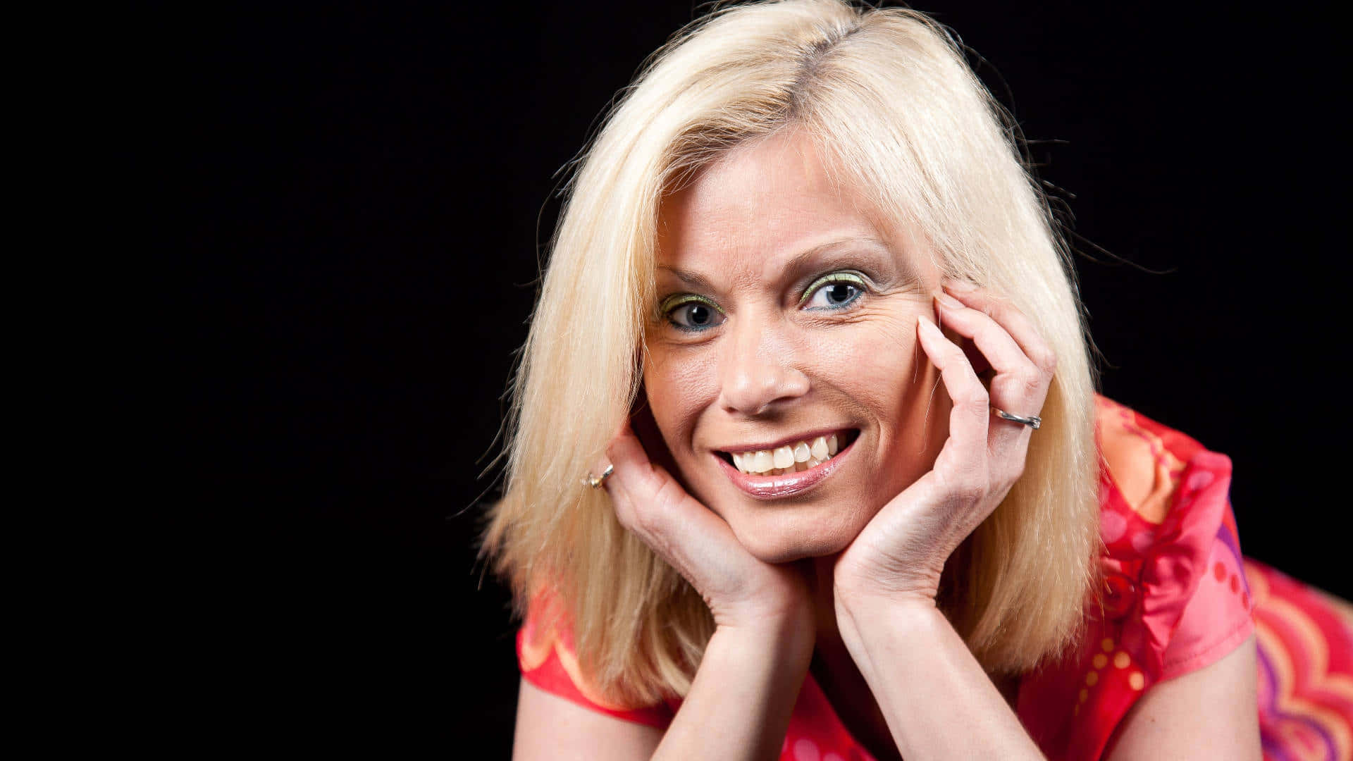 blonde woman, bright blue eyes, smiles warmly, Full HD Desktop Wallpaper