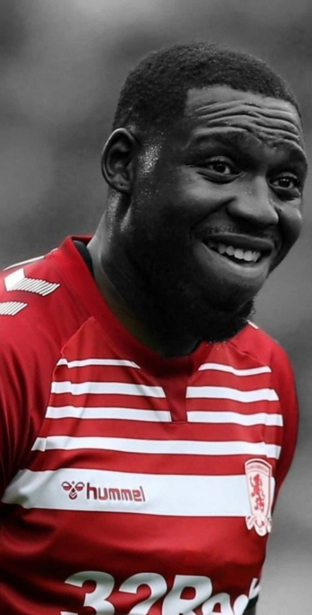 Middlesbrough, red and white striped jersey, black footballer, Full HD Phone Wallpaper