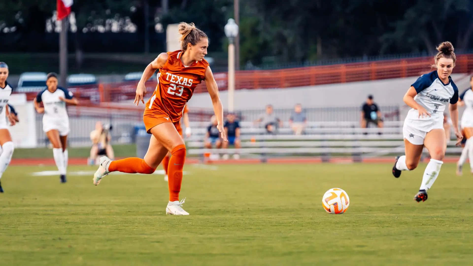 female soccer player, orange Texas jersey, number 23, Full HD Desktop Wallpaper