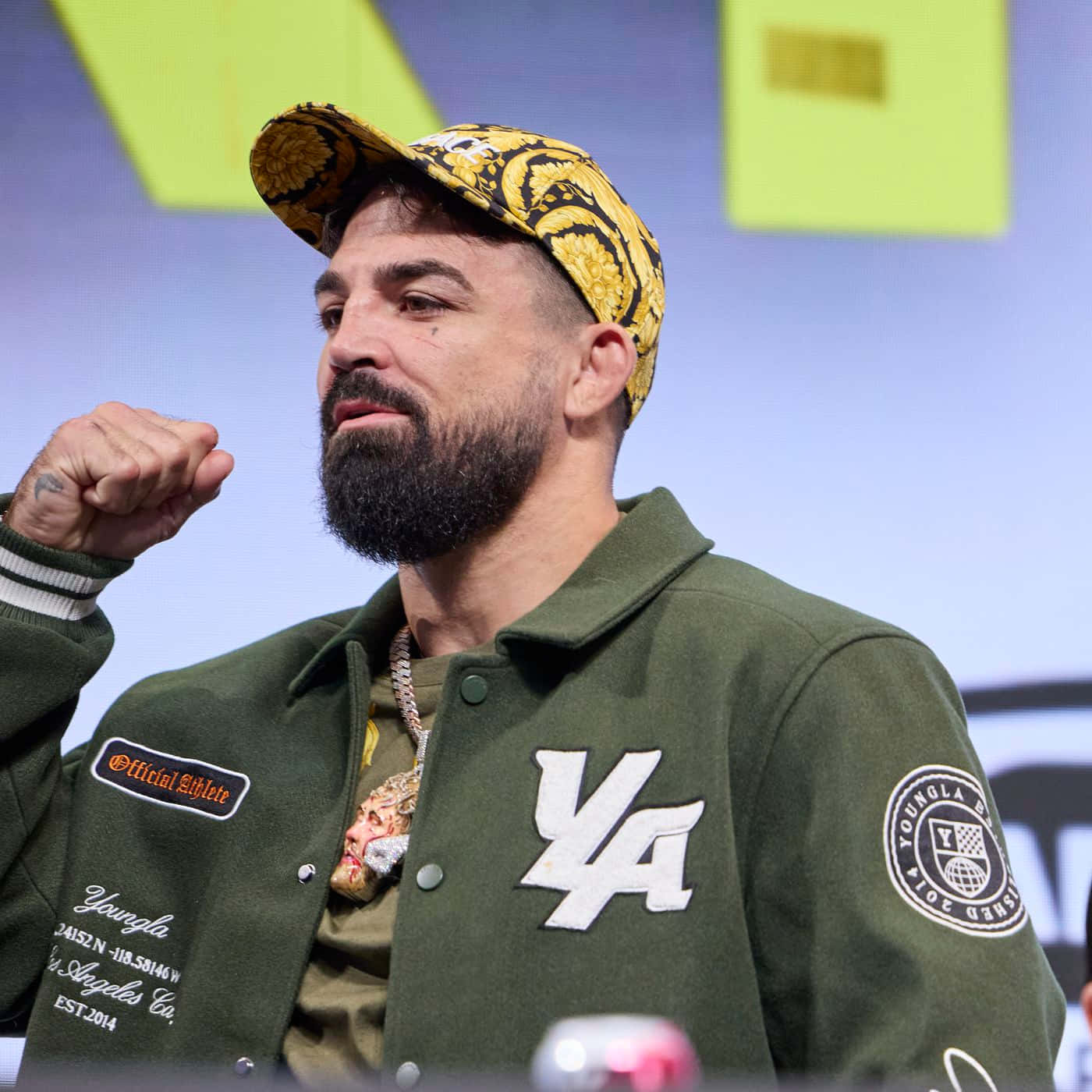 Mike Perry, green varsity jacket, ornate yellow cap, HD Desktop Wallpaper