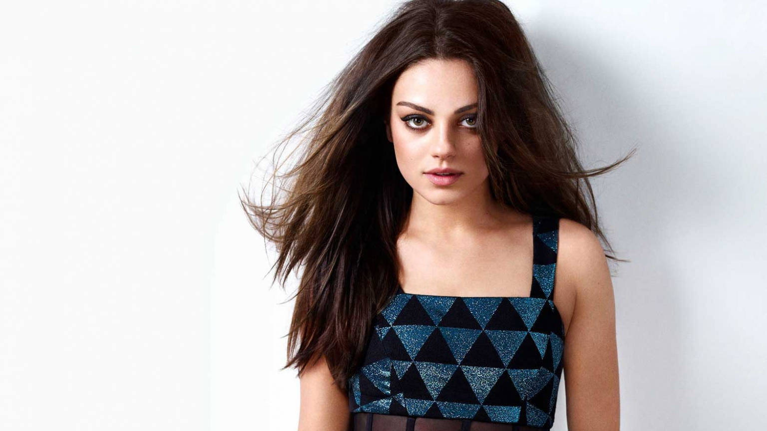 Mila Kunis, blue and black geometric top, flowing brown hair, HD Desktop Wallpaper