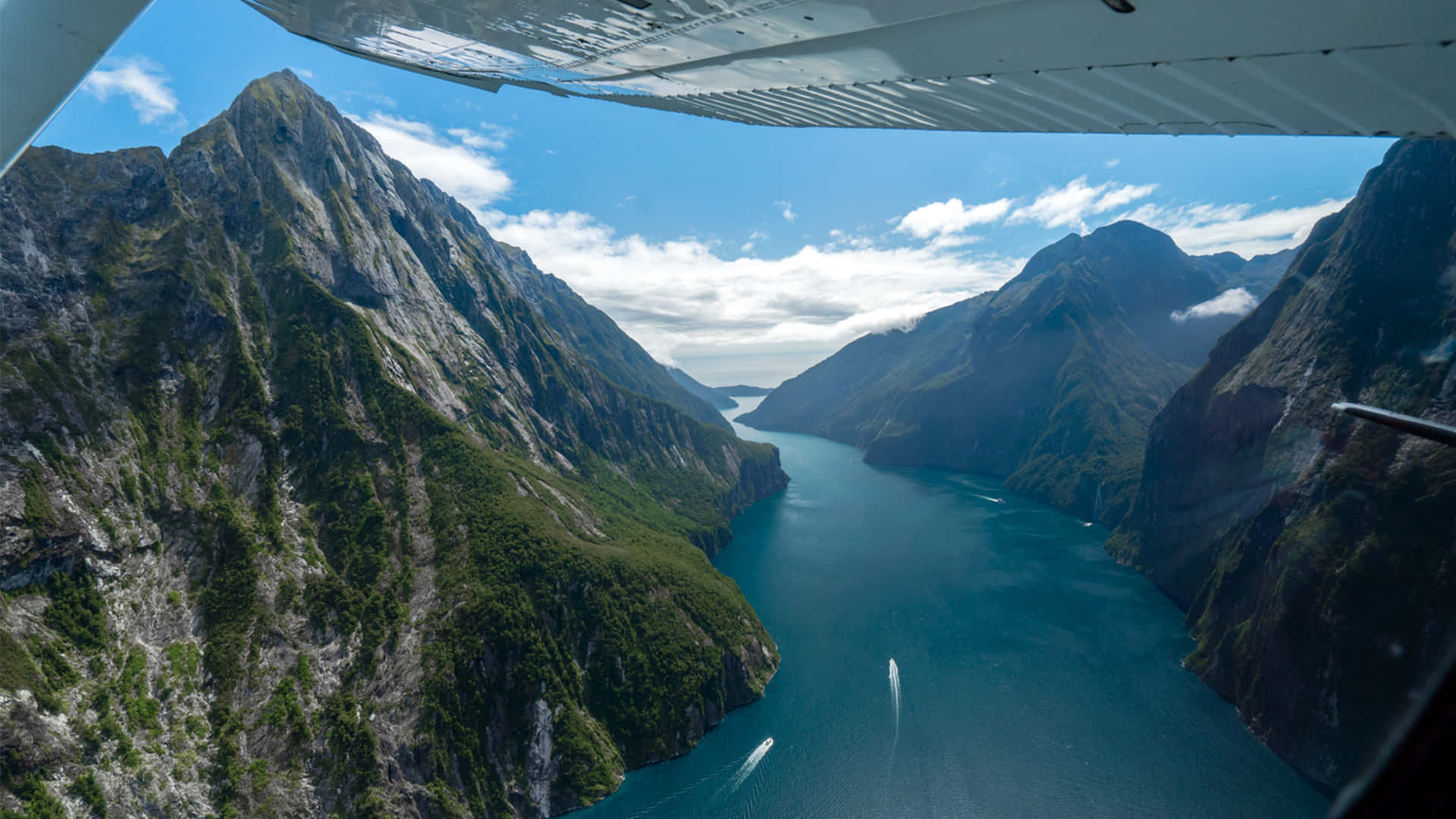 Milford Sound, deep blue fjord, towering green and gray mountains, Full HD Desktop Wallpaper