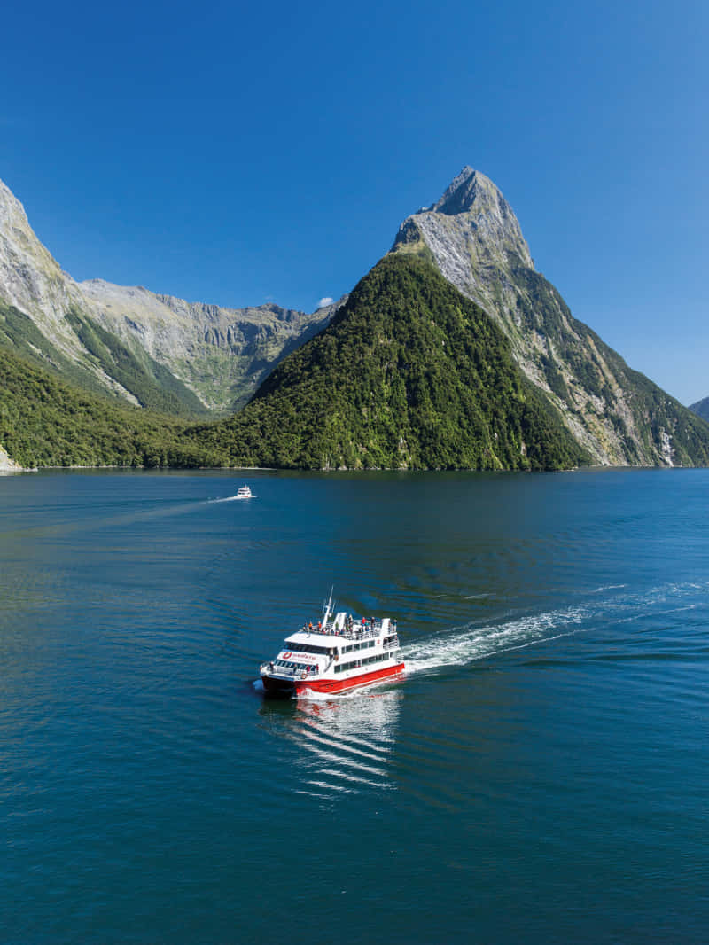 Milford Sound, sailing ship, red and white, SD Phone Wallpaper