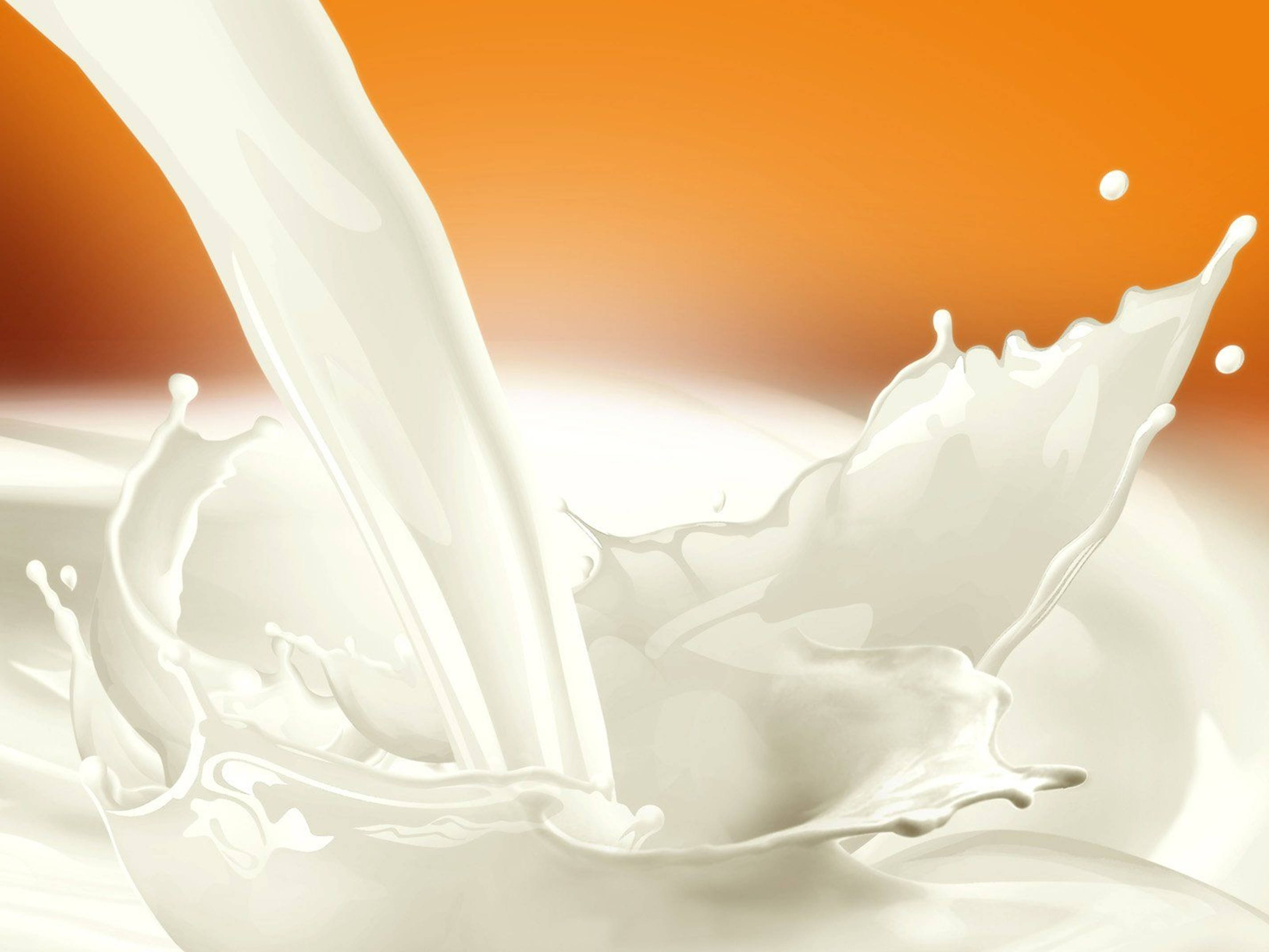 poured milk, creamy white liquid, warm orange gradient background, 2K Desktop Wallpaper