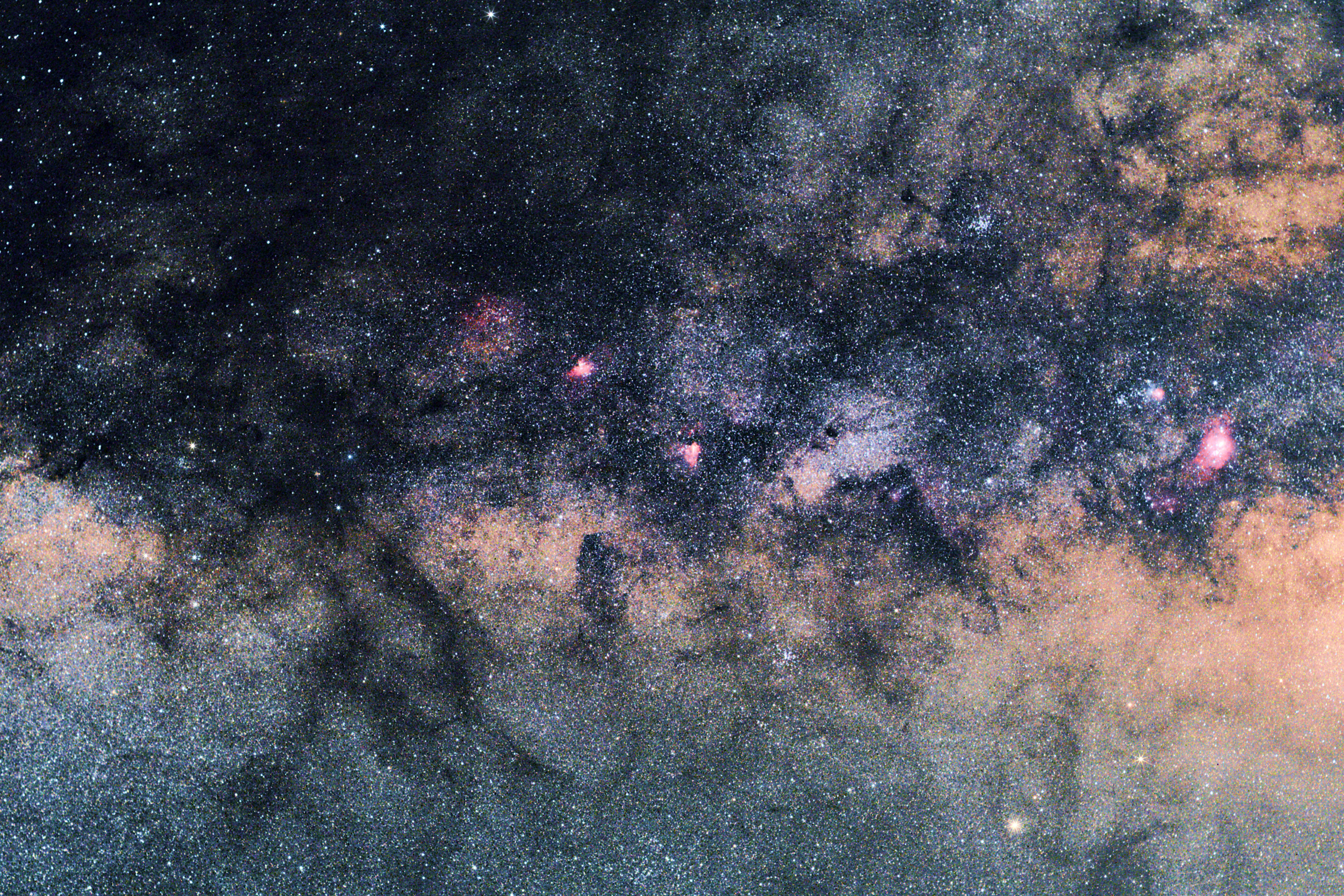 Milky Way, glowing pink nebulae, dense star fields, 4K Desktop Wallpaper