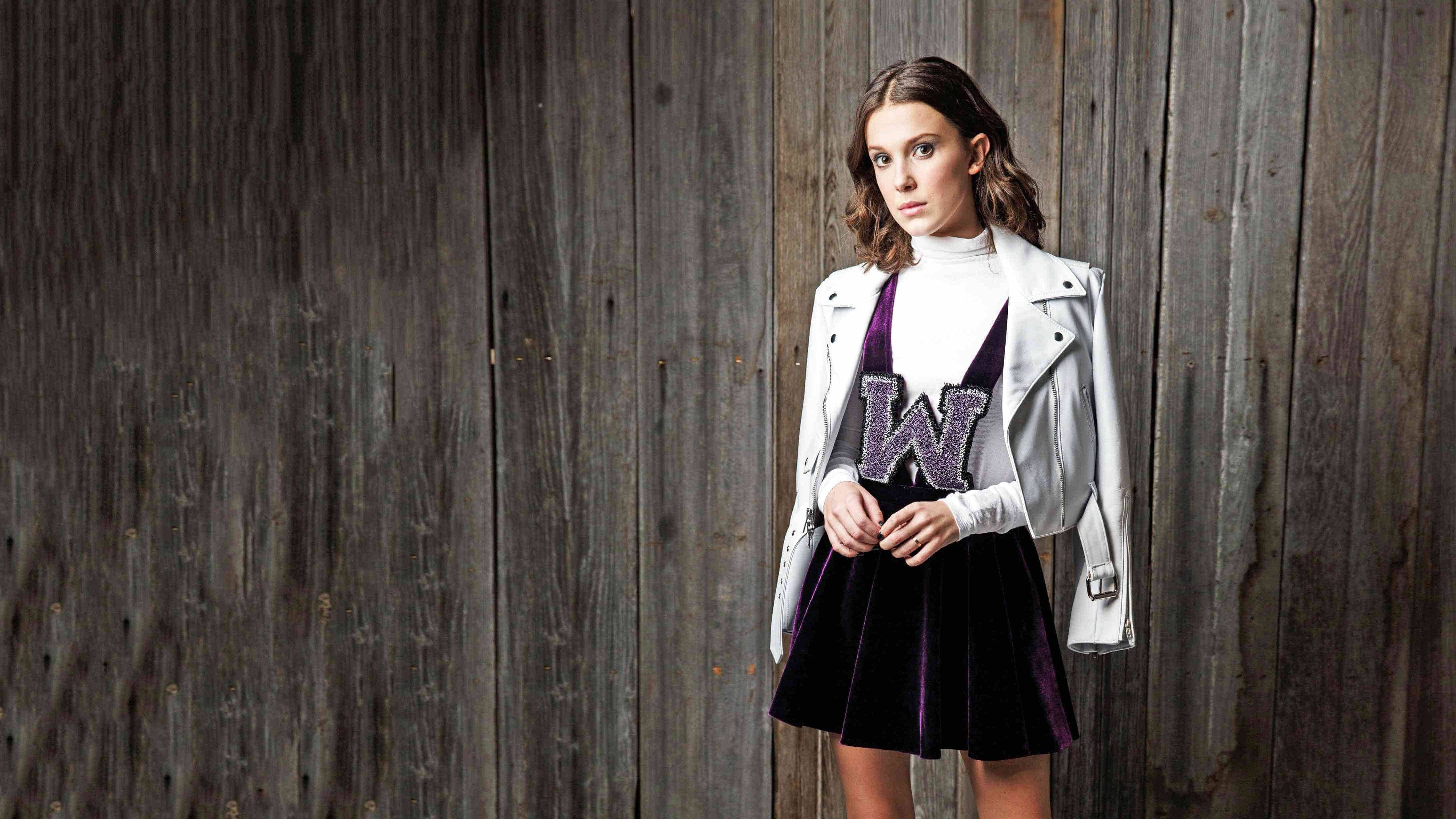 Millie Bobby Brown, white leather jacket, purple velvet dress, 4K Desktop Wallpaper