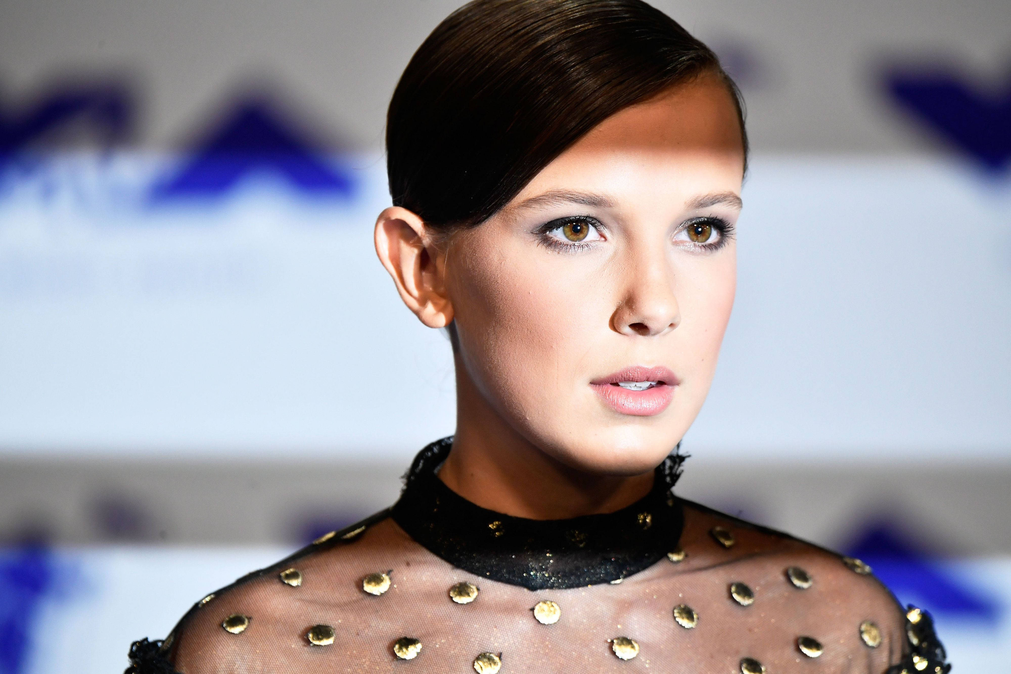 Millie Bobby Brown, sleek dark hair, striking eyes, 4K Desktop Wallpaper