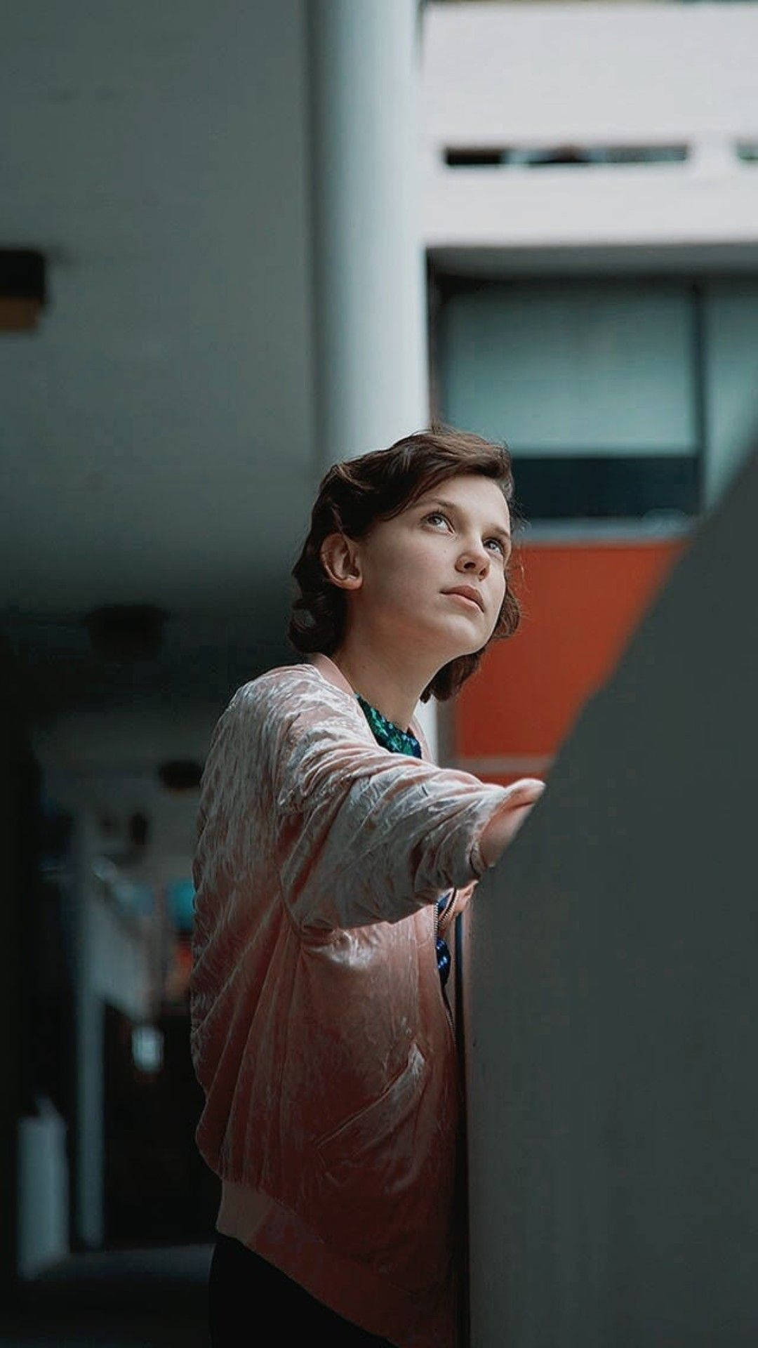 Millie Bobby Brown, pink velvet jacket, modern indoor space, Full HD Phone Wallpaper