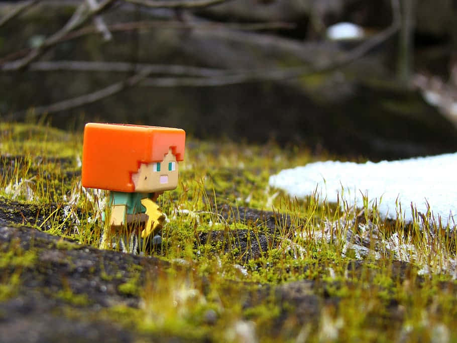 Minecraft Alex, pixelated Minecraft character figurine, vibrant green moss, SD Desktop Wallpaper
