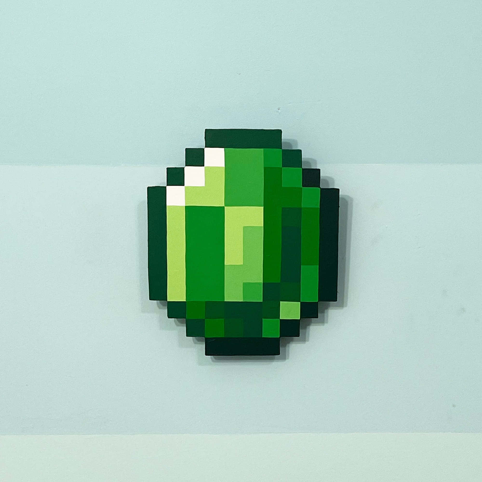 Minecraft Emeralds, pixelated green diamond block, light blue wall, Full HD Desktop Wallpaper