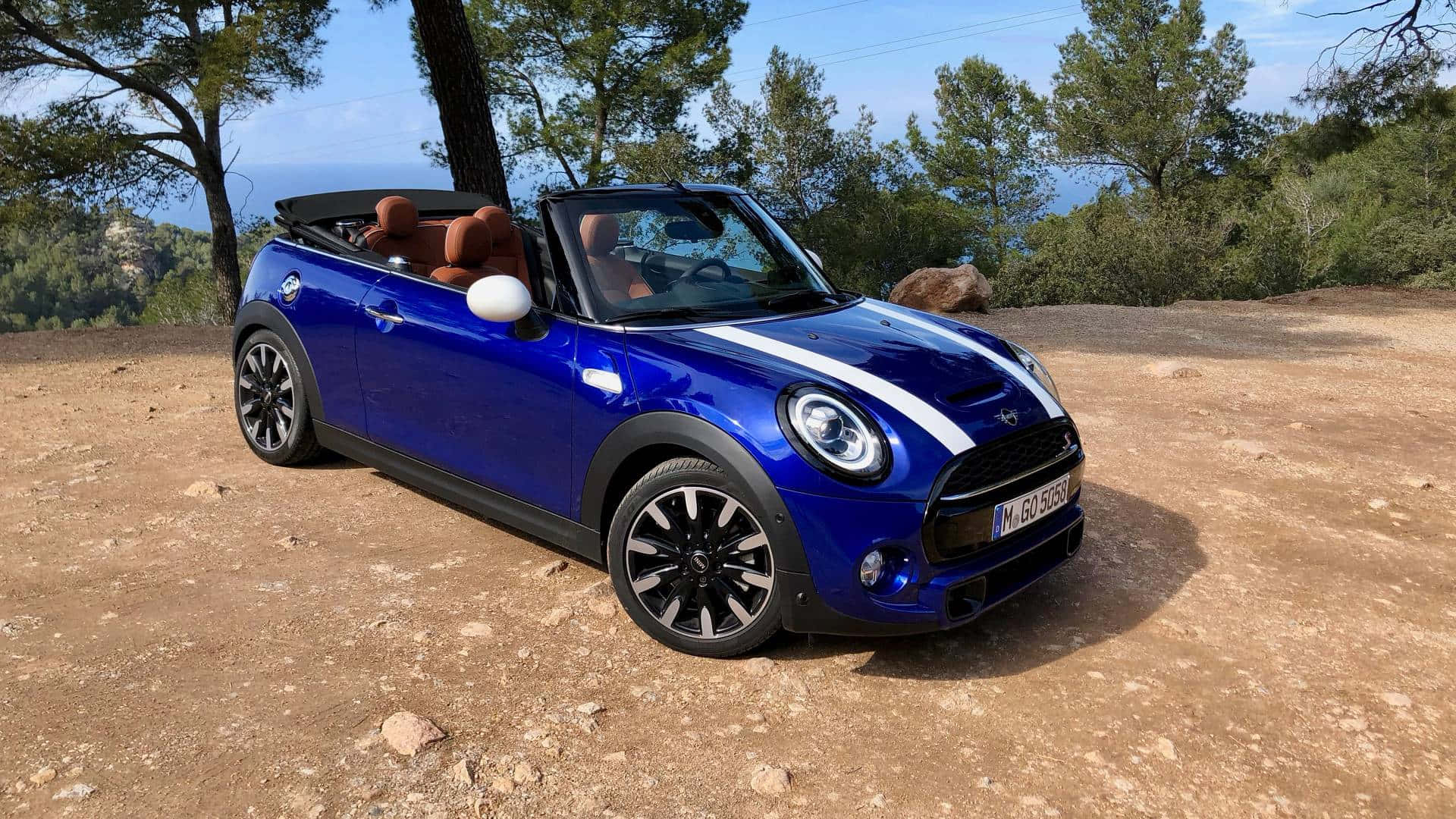 Mini Cooper Convertible, vibrant blue, sunlit dirt path, Full HD Desktop Wallpaper