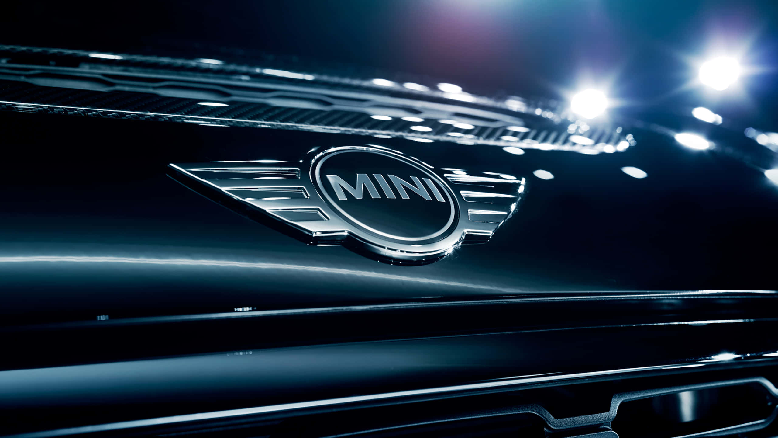 MINI logo, chrome, sleek black car hood, 2K Desktop Wallpaper