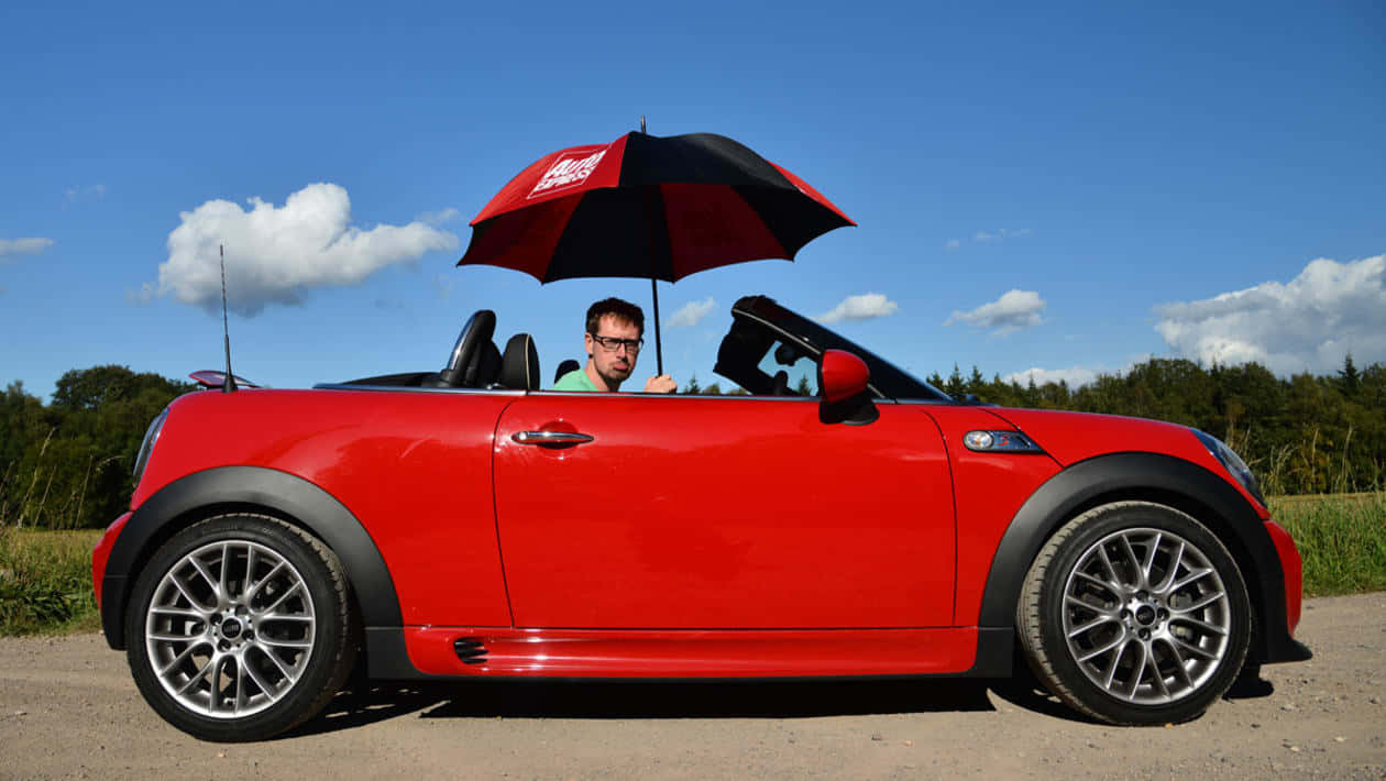Red Mini Roadster, red and black umbrella, bright blue sky, SD Desktop Wallpaper