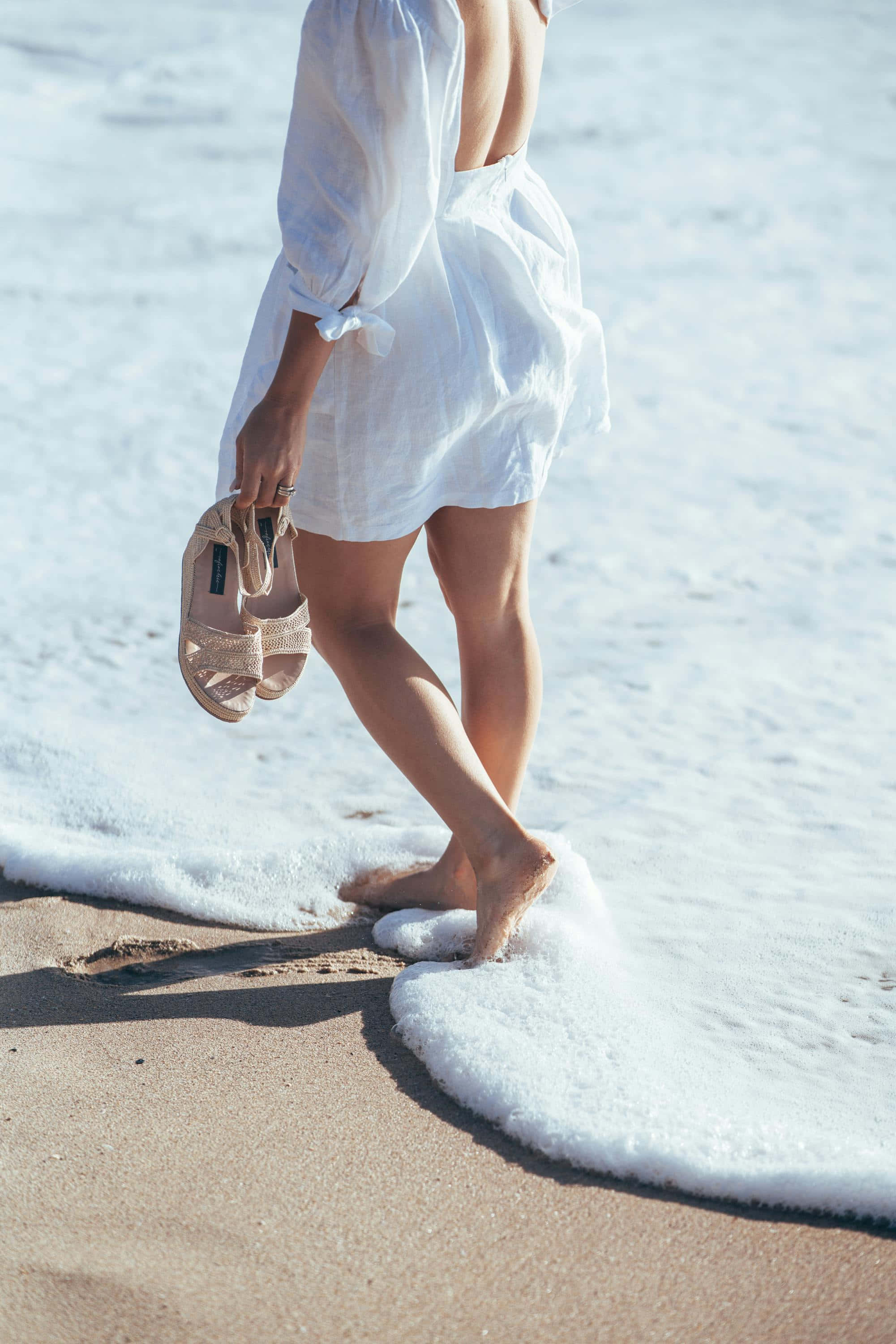 white dress, sunlit sand, ocean foam, 2K Phone Wallpaper