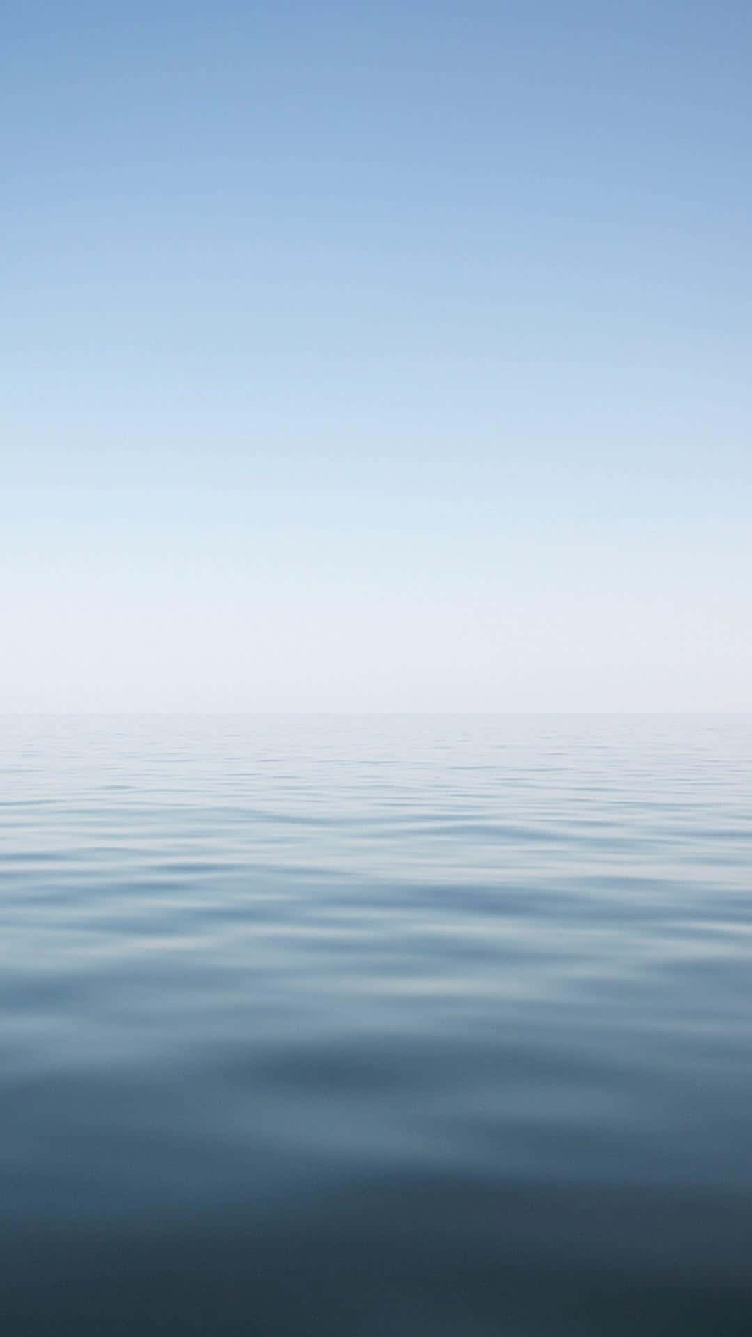 minimalist ocean, calm blue water, soft gradient sky, Full HD Phone Wallpaper