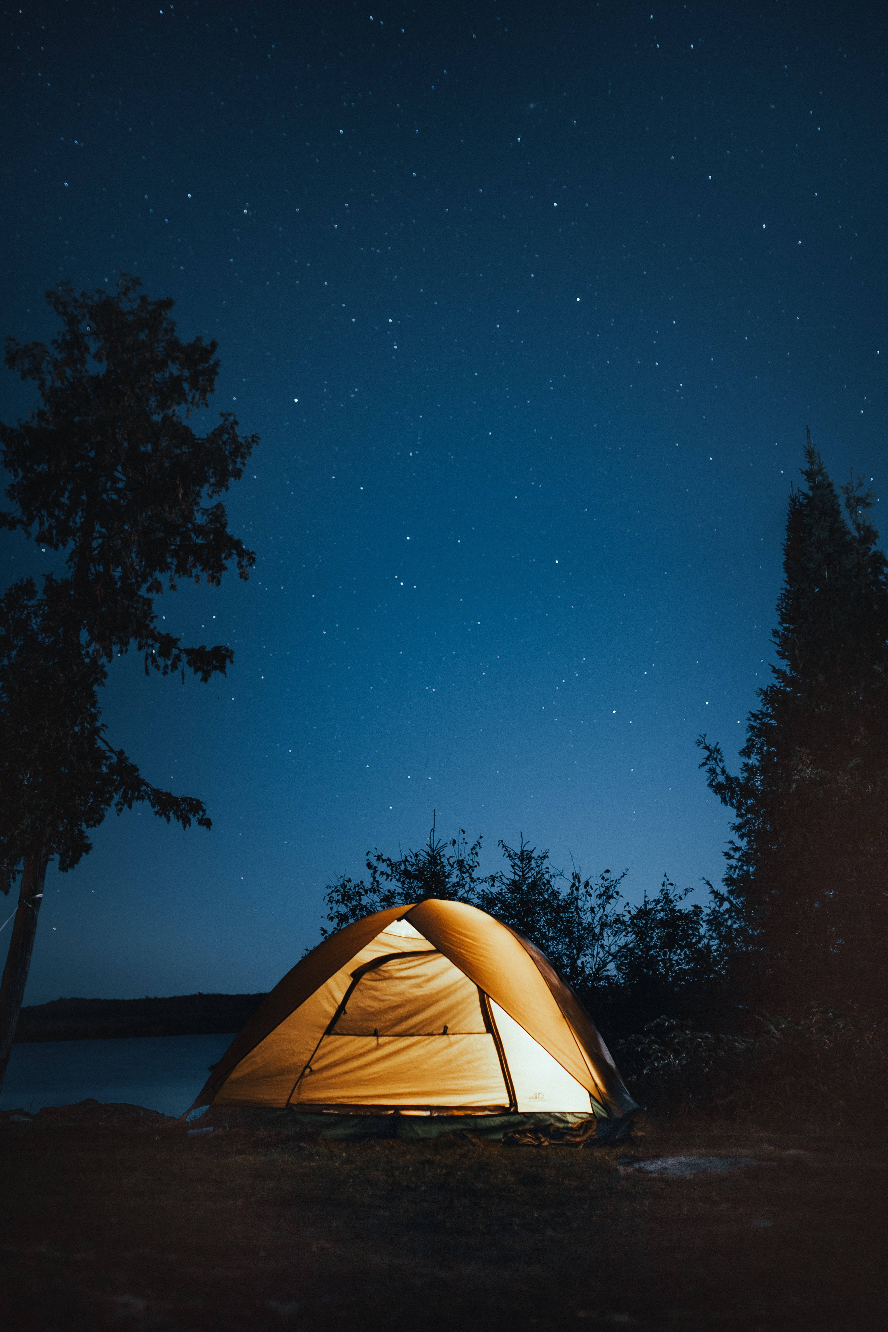 orange tent, vast starry night sky, calm lake, 5K Phone Wallpaper
