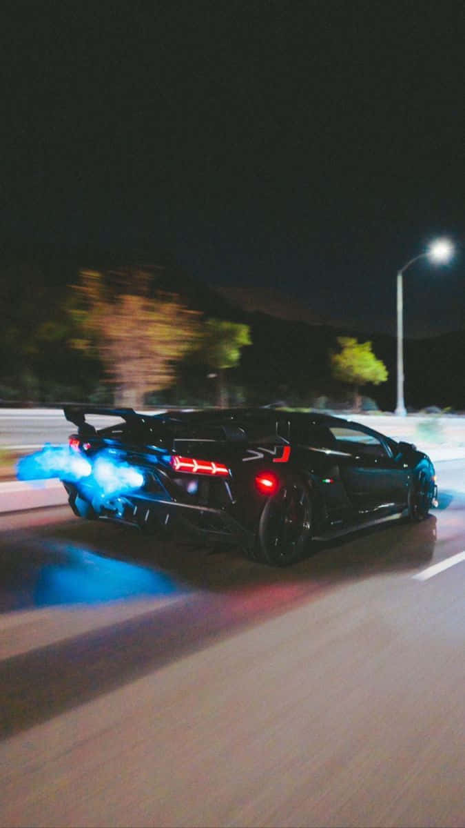 black sports car, glowing blue exhaust flames, night street, SD Phone Wallpaper