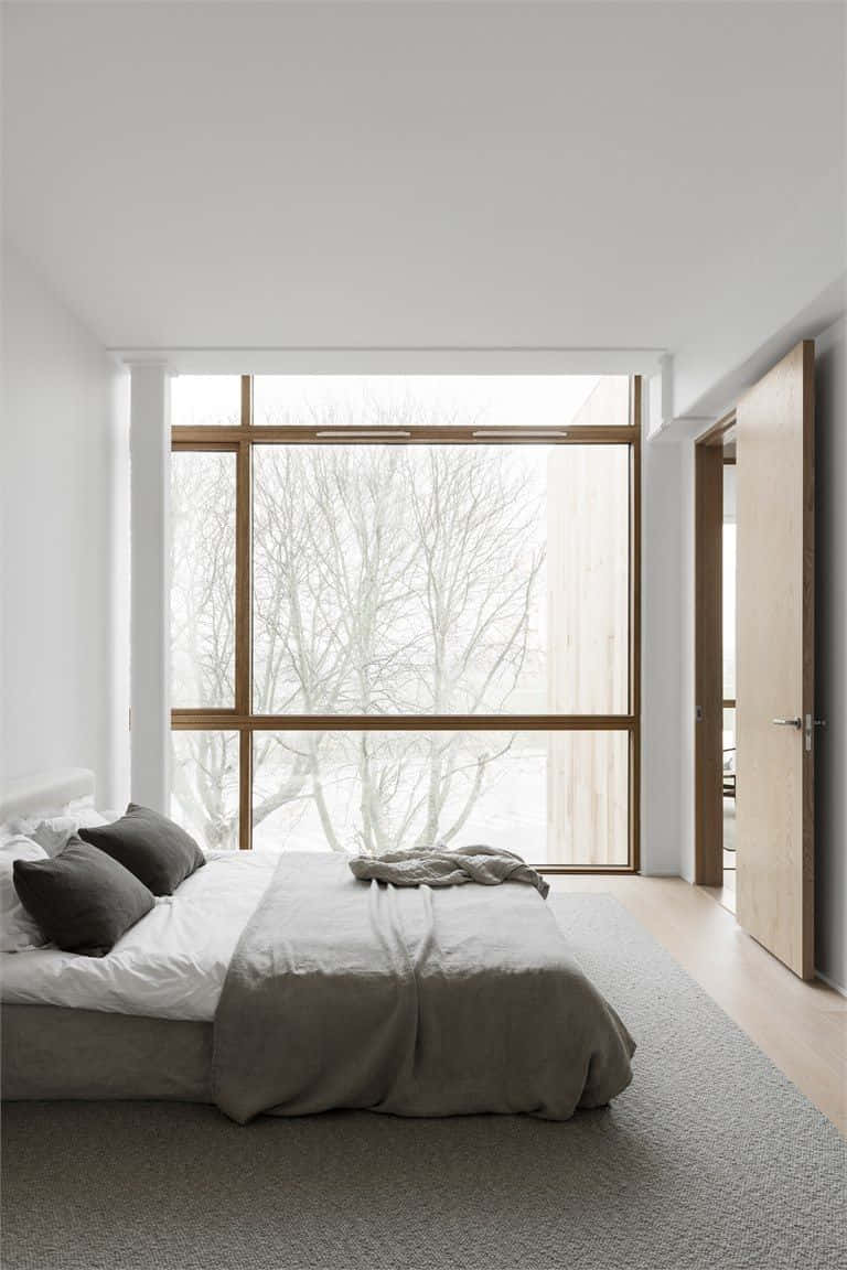 minimalist bedroom, large window, bare winter trees, SD Phone Wallpaper