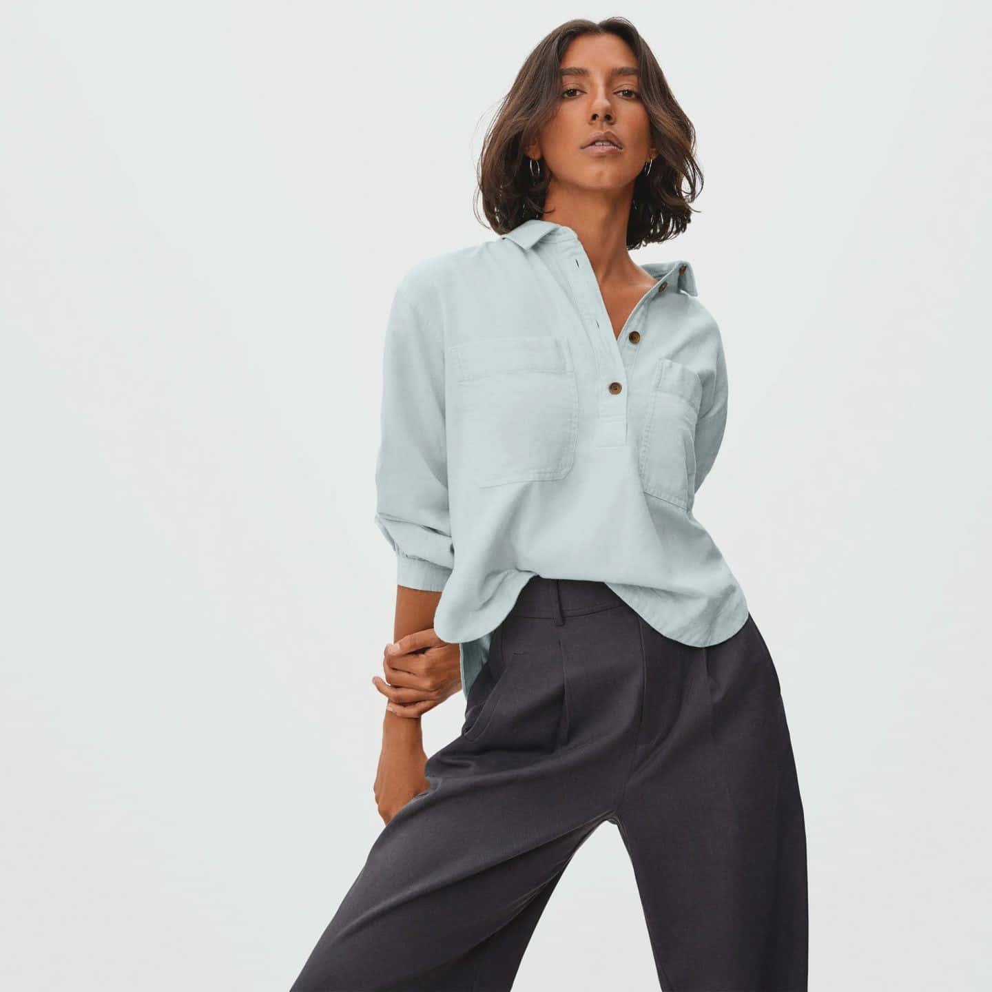 light blue button-up shirt, dark grey trousers, plain white background, HD Desktop Wallpaper