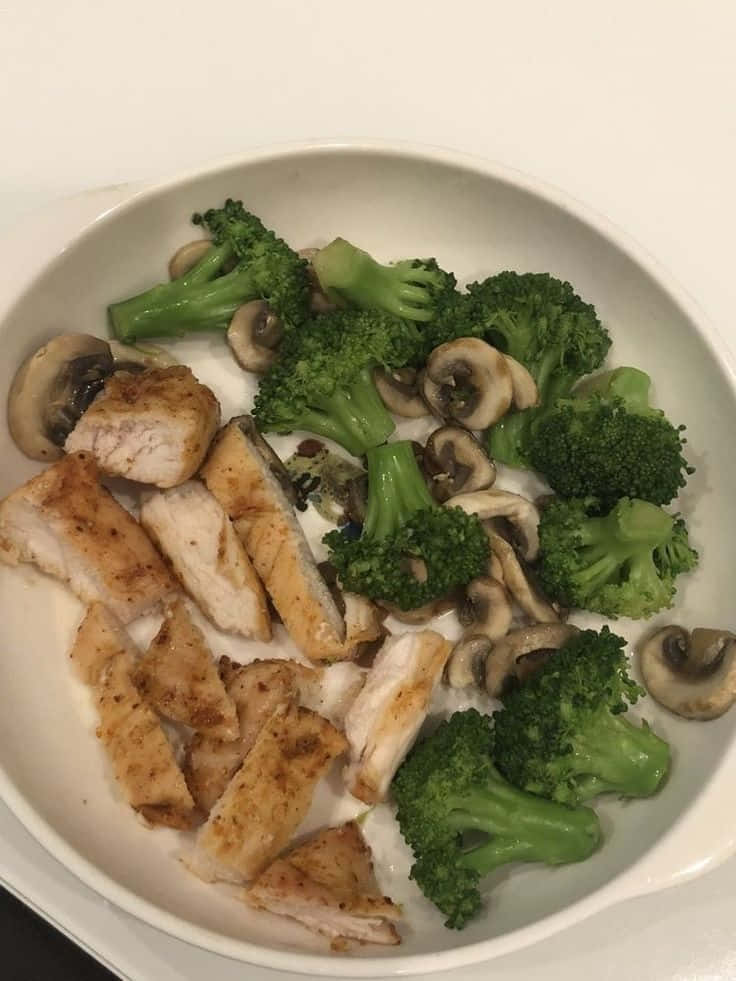 white bowl, tender grilled chicken strips, vibrant green broccoli florets, SD Phone Wallpaper
