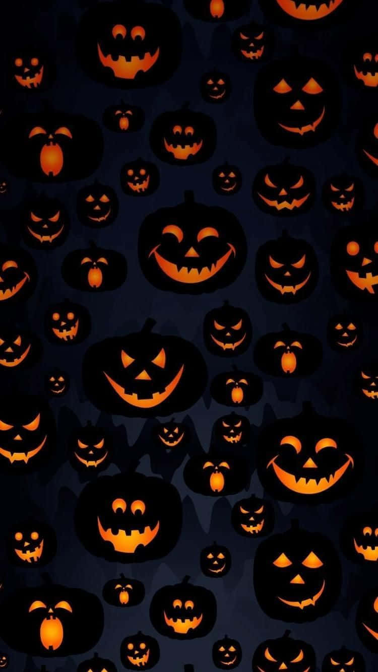 dark blue background, glowing orange jack-o'-lanterns, smiling expressions, HD Phone Wallpaper