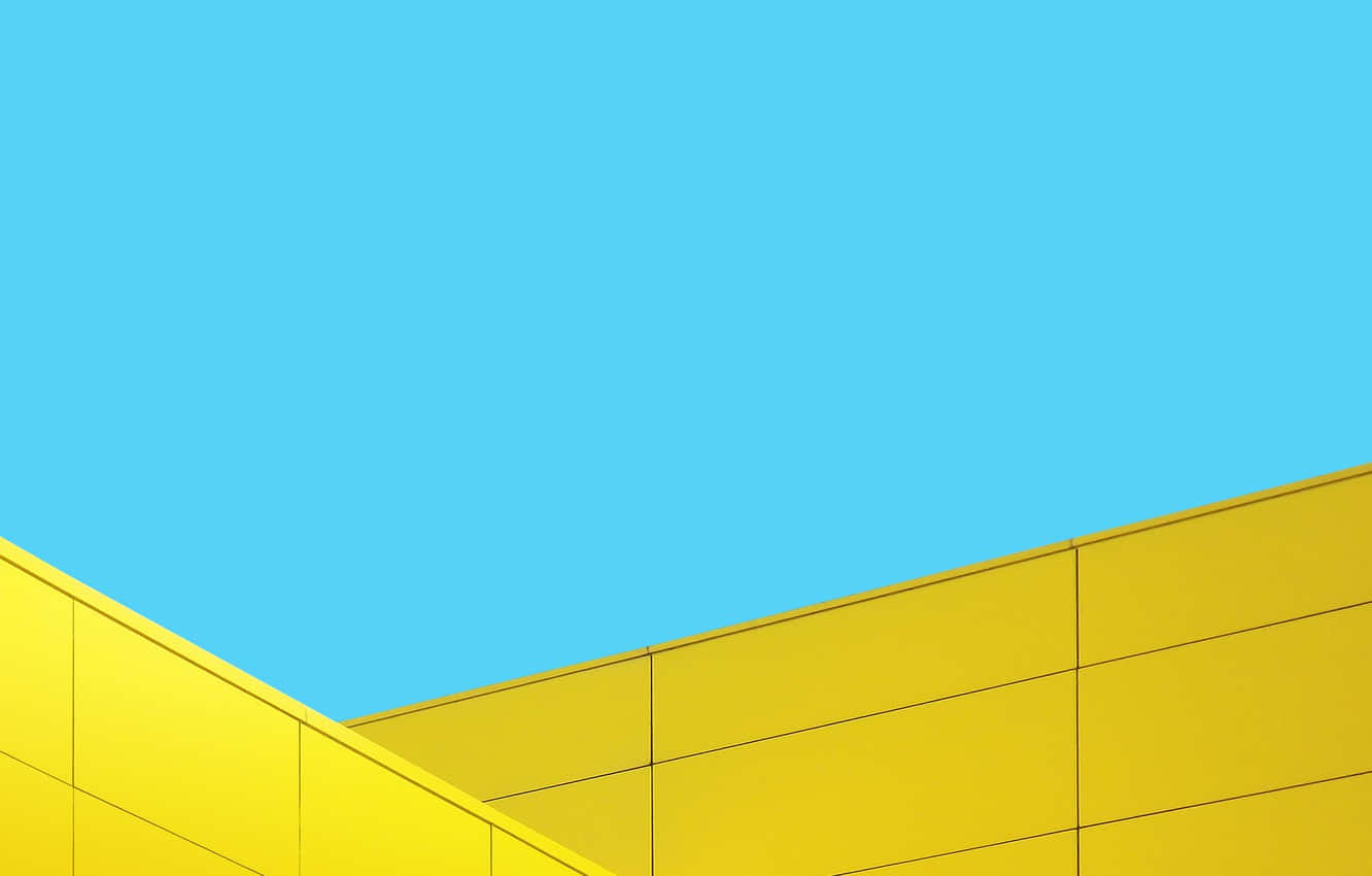 vibrant yellow, geometric building facade, clear blue sky, HD Desktop Wallpaper