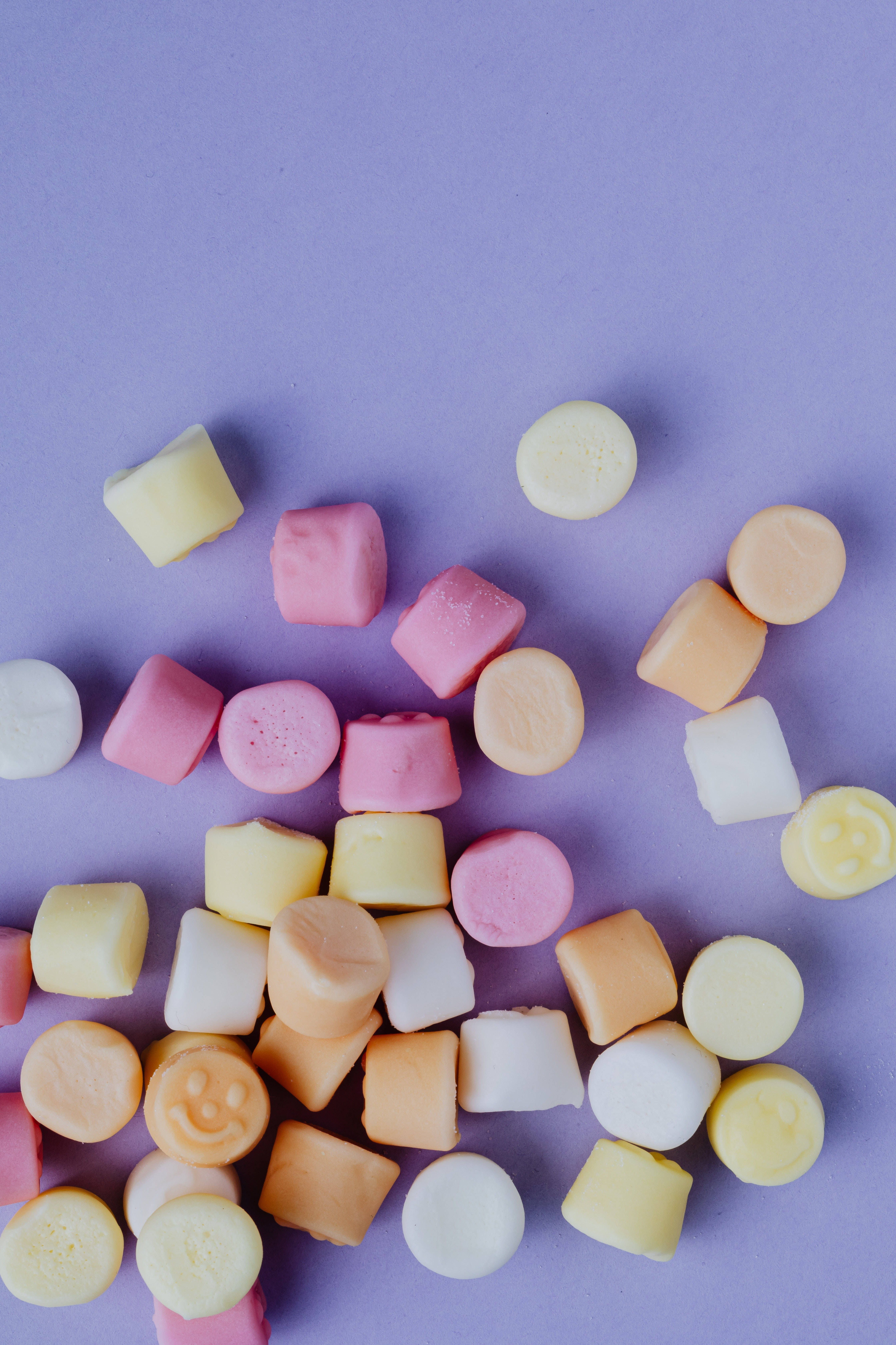 pastel purple, soft lavender background, pastel-colored marshmallows, 5K Phone Wallpaper
