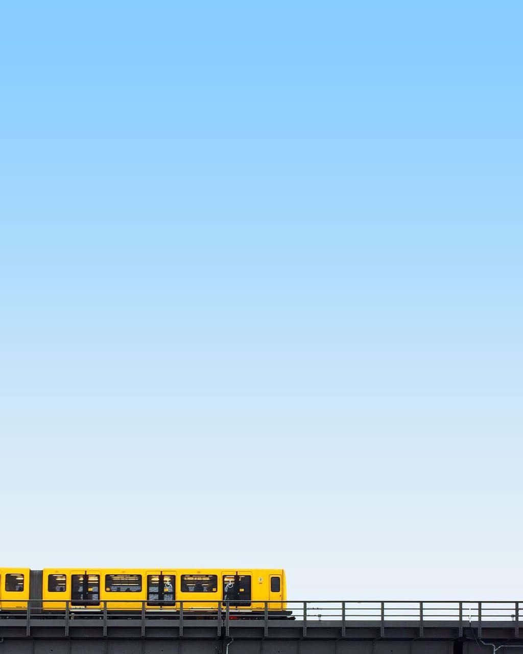 bright yellow train, elevated track, vast clear blue sky, HD Phone Wallpaper