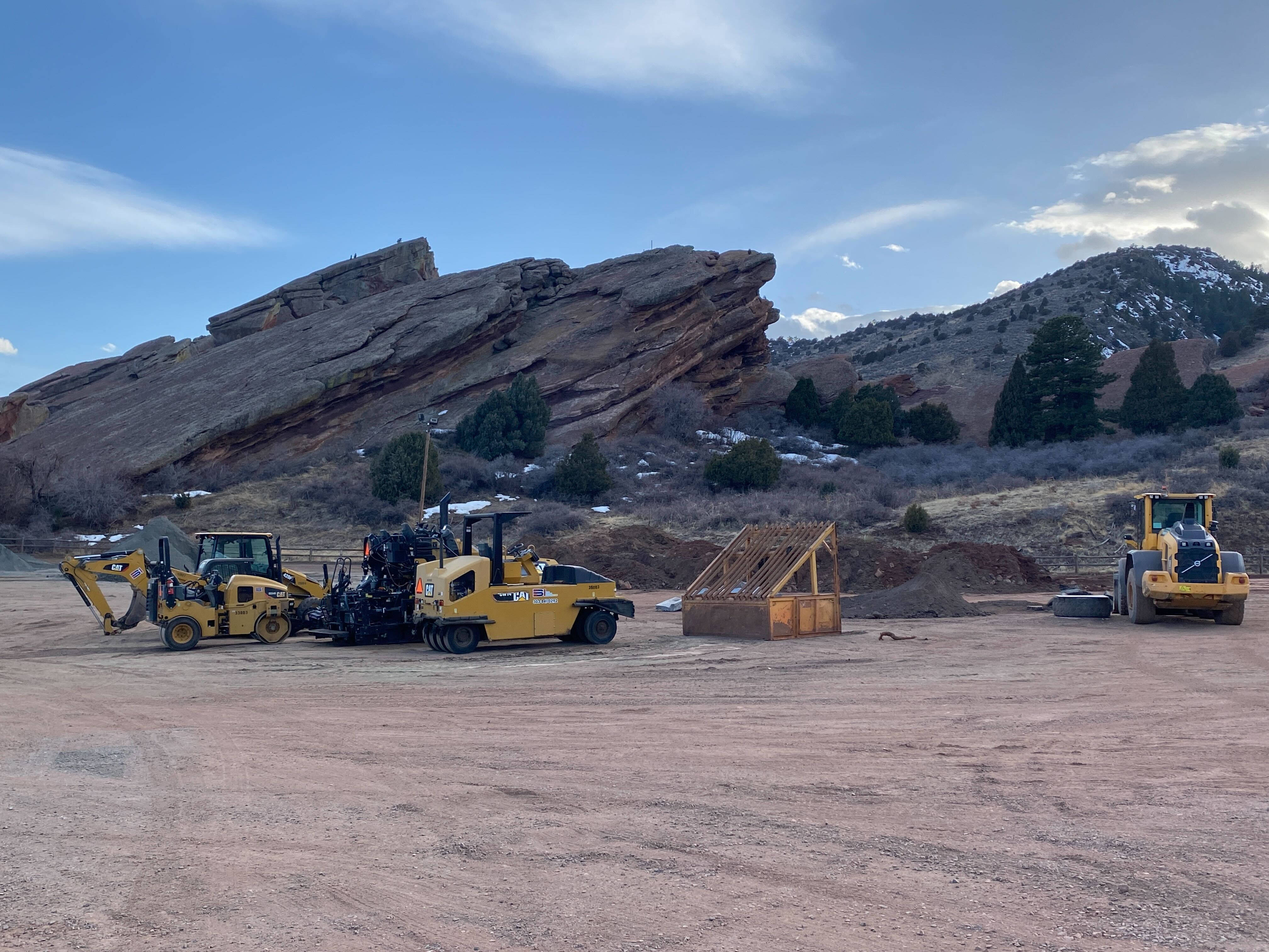 yellow construction vehicles, dusty lot, vast blue sky, 4K Desktop Wallpaper