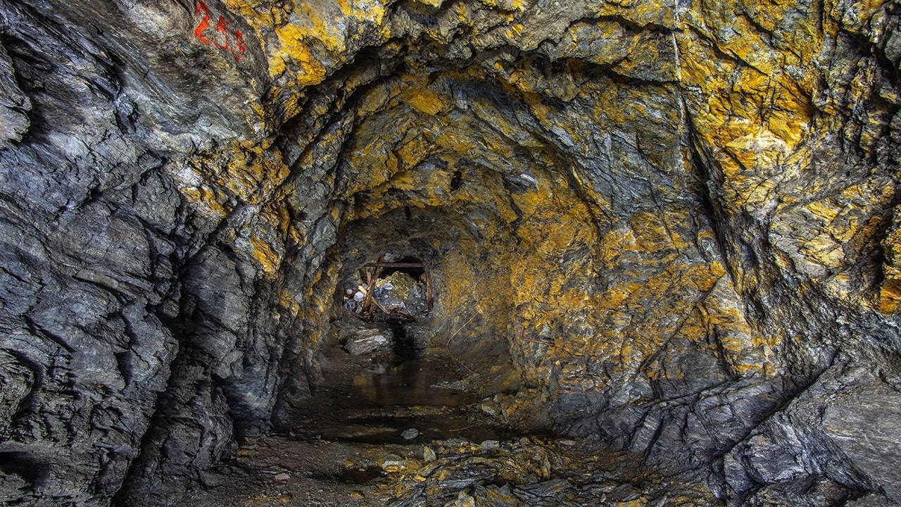 goldmines adit, vibrant yellow mineral deposits, rough gray rock walls, HD Desktop Wallpaper