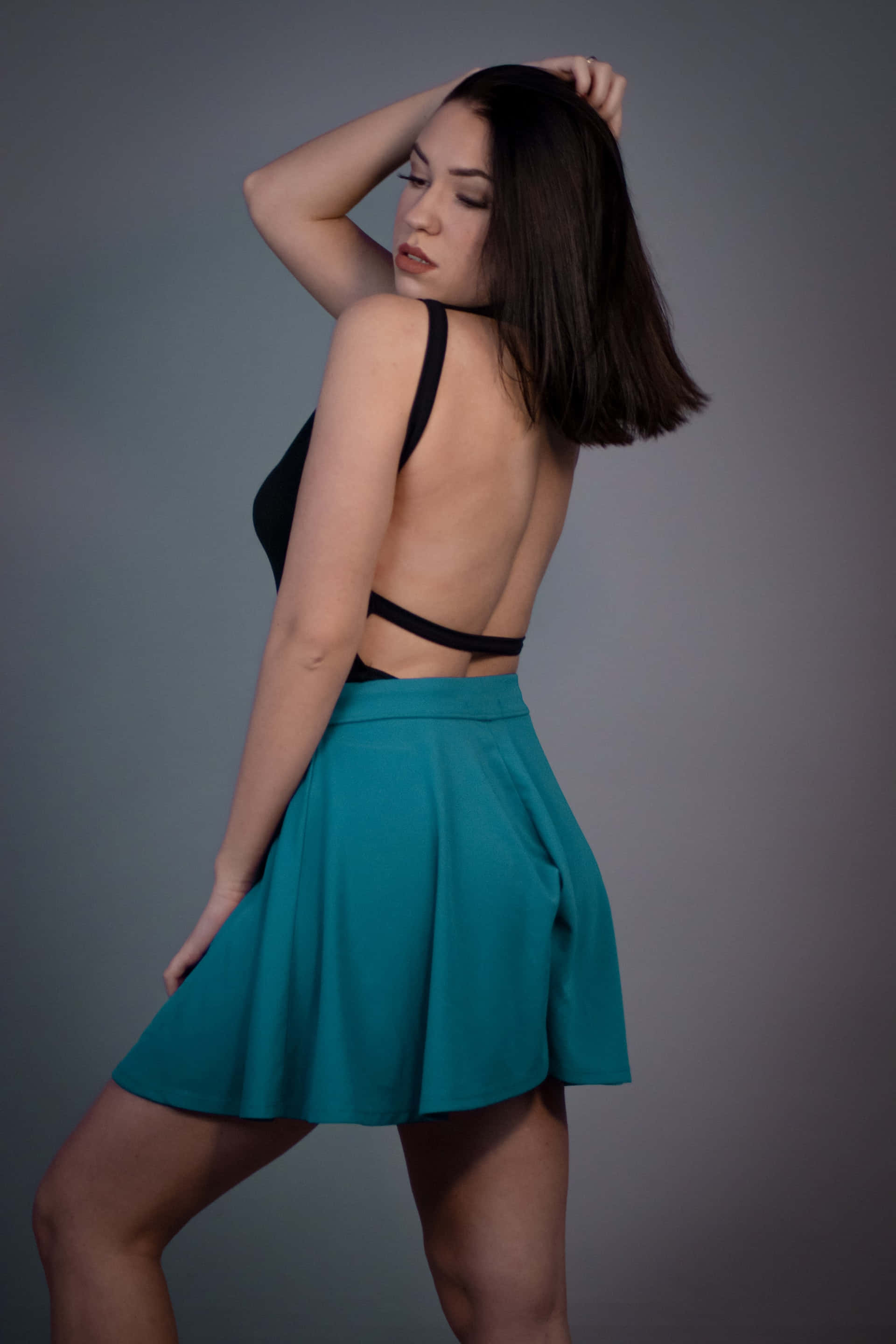 blue green pleated miniskirt, teal skirt, black backless top, 2K Phone Wallpaper