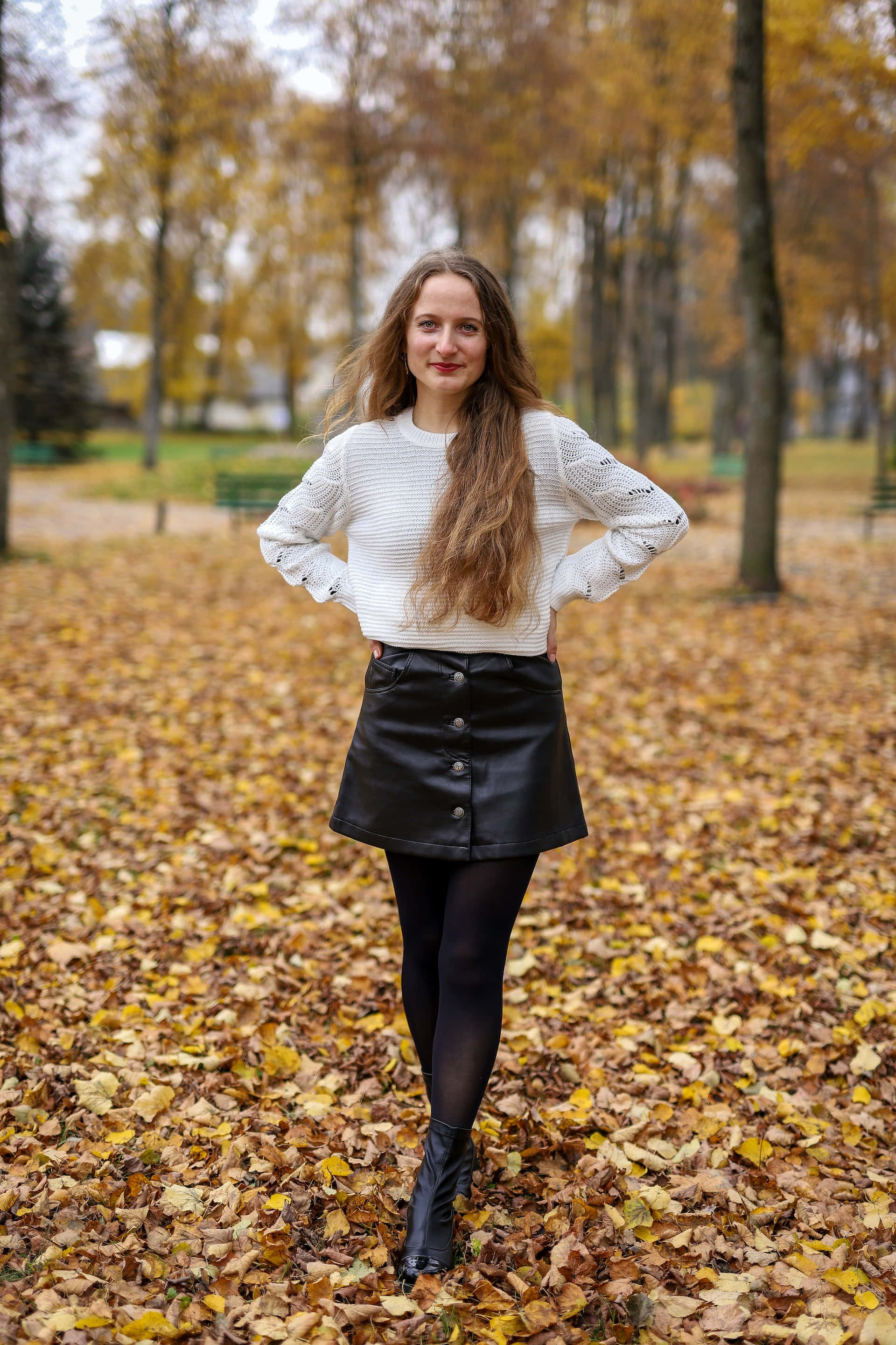 black leather skirt, golden autumn leaves, white sweater, 2K Phone Wallpaper