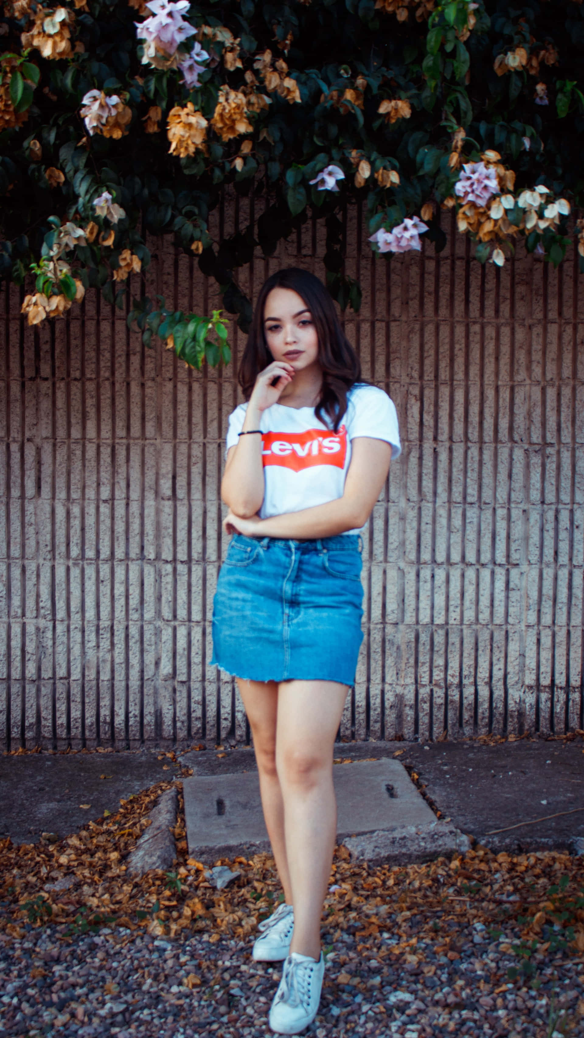 Levi's tee, denim skirt, wooden fence, 2K Phone Wallpaper