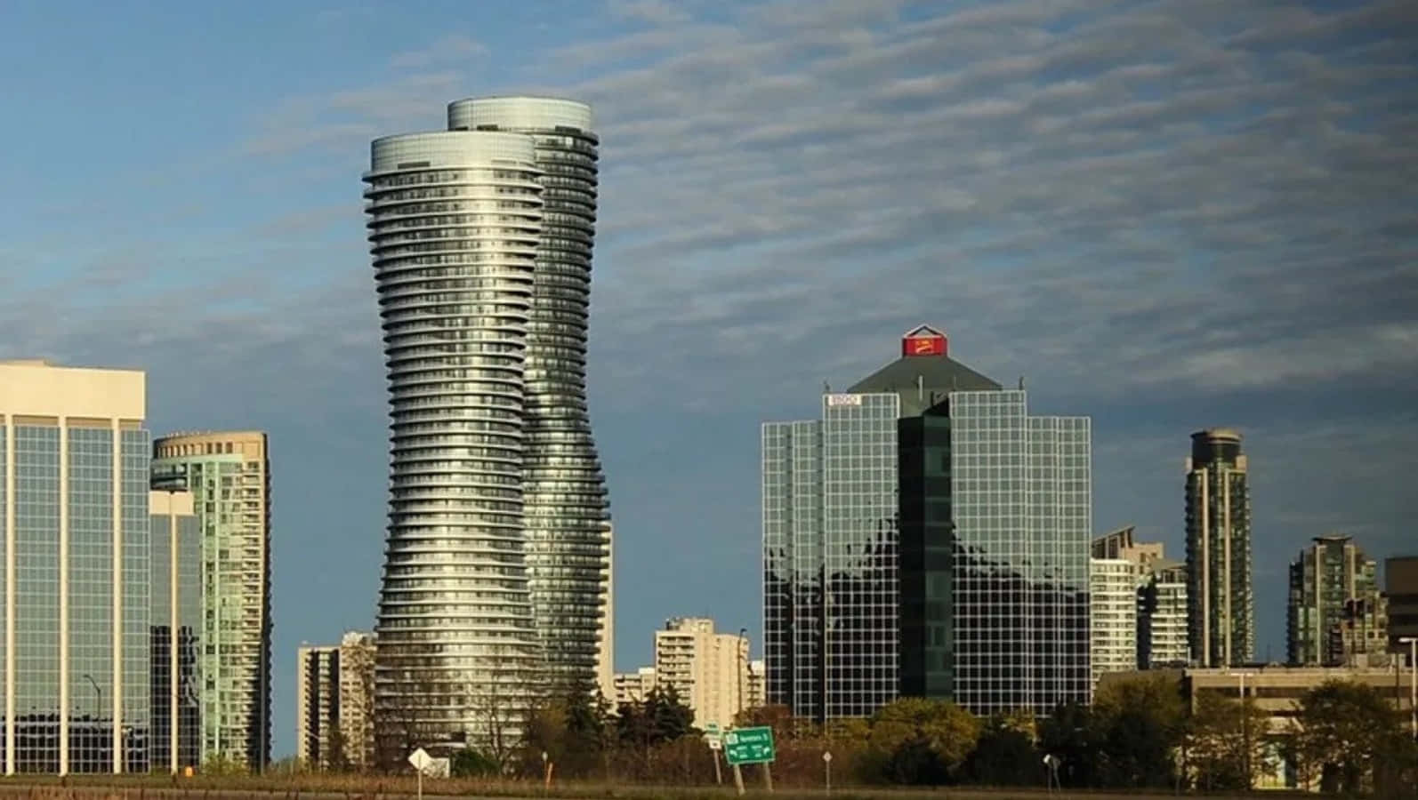 Mississauga, twisting glass skyscraper, partly cloudy sky, HD Desktop Wallpaper