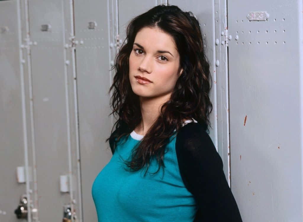 Missy Peregrym, gray metal lockers, teal top, SD Desktop Wallpaper