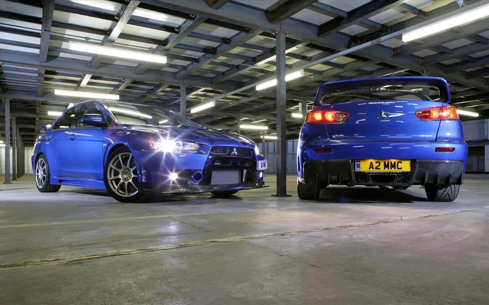 Mitsubishi Lancer Evolution, vibrant blue, industrial garage, HD Desktop Wallpaper