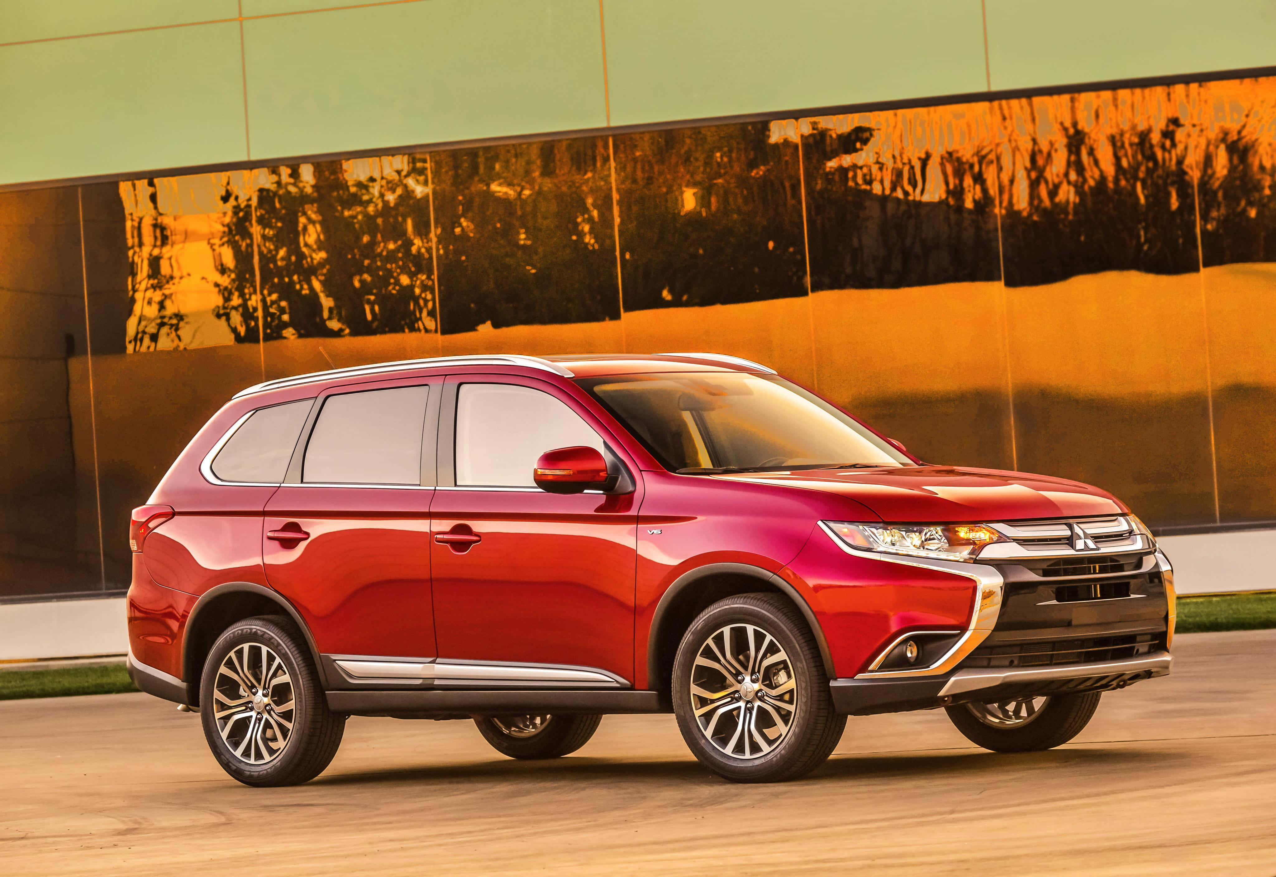 Mitsubishi Outlander, glossy red, asphalt road, 4K Desktop Wallpaper