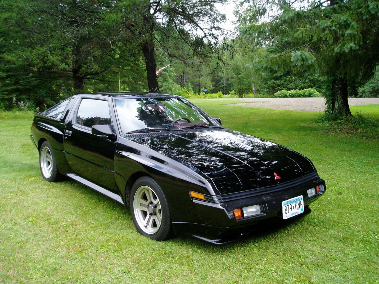 Mitsubishi Starion, sleek black, grassy lawn, HD Desktop Wallpaper