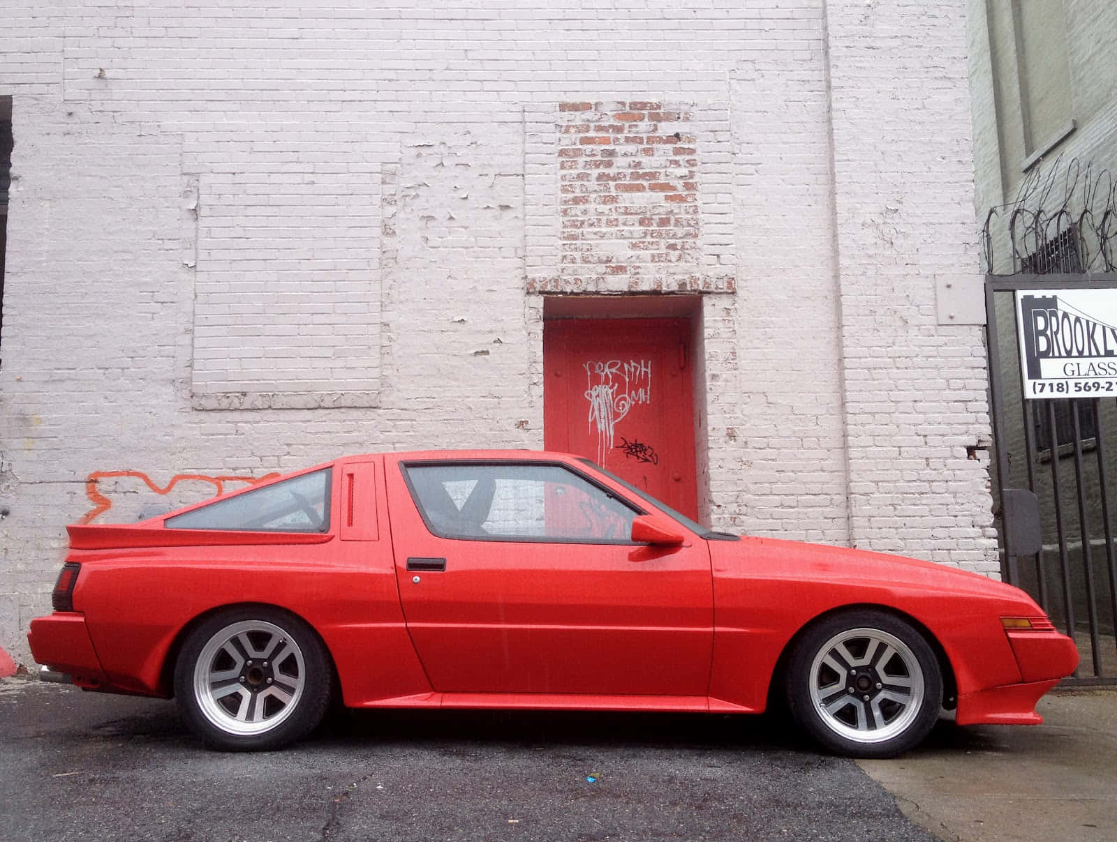 Mitsubishi Starion, vibrant red, weathered white brick wall, HD Desktop Wallpaper