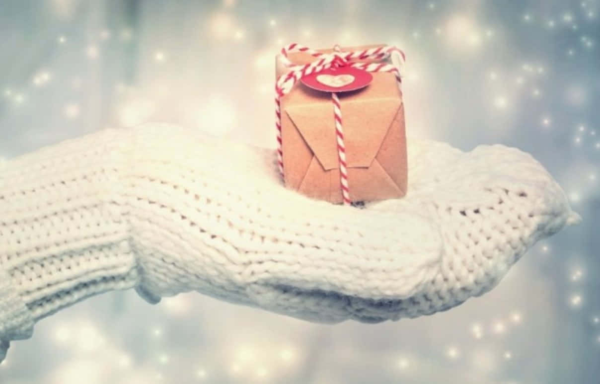 Mittens, white knitted hand, small brown gift box, SD Desktop Wallpaper